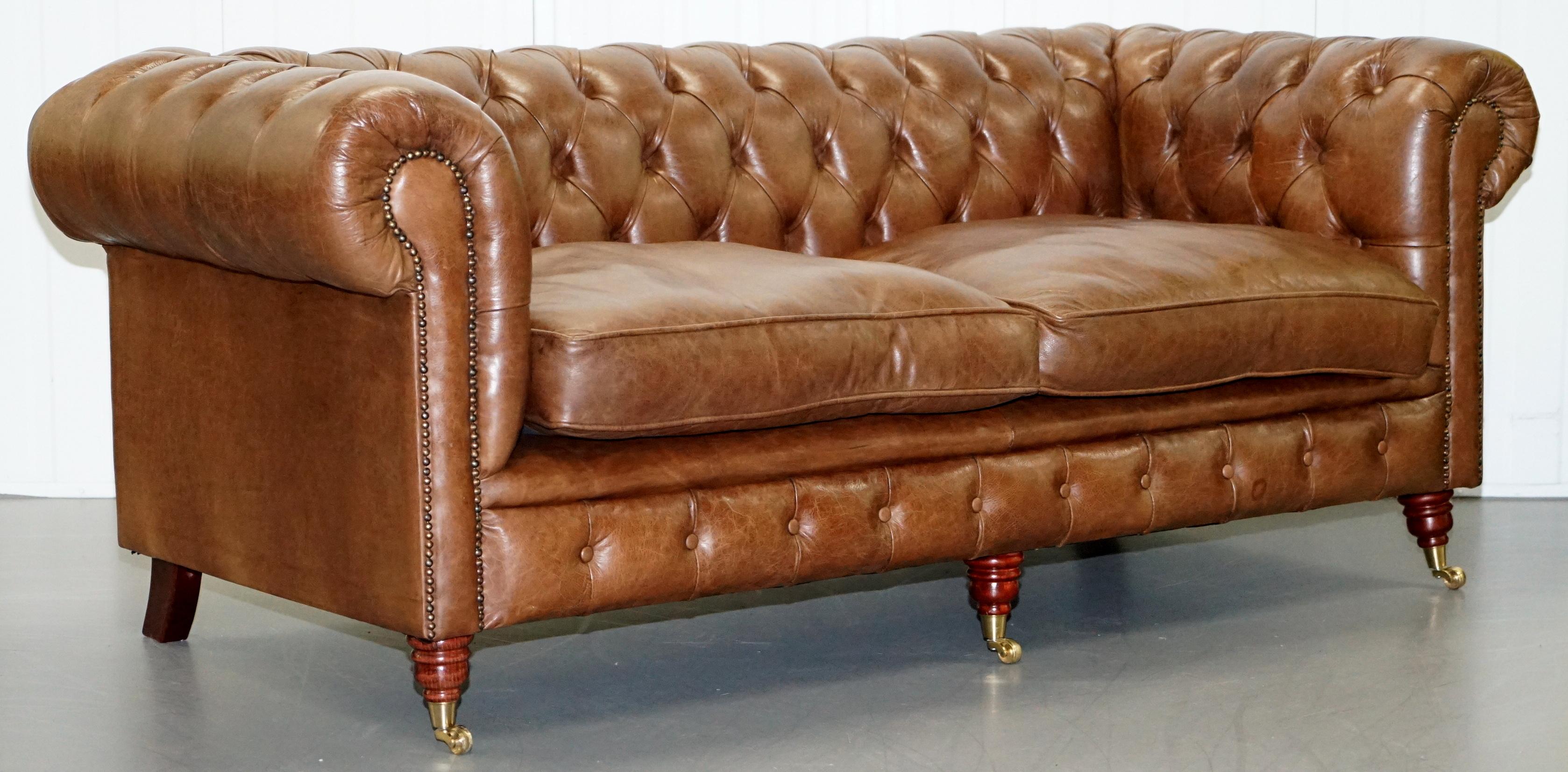 We are delighted to this stunning Heritage brown leather Chesterfield suite of sofas with armchair

A very good looking and well made suite in lovely condition throughout, the small sofa seats 3 people comfortably, the larger 4 people, the