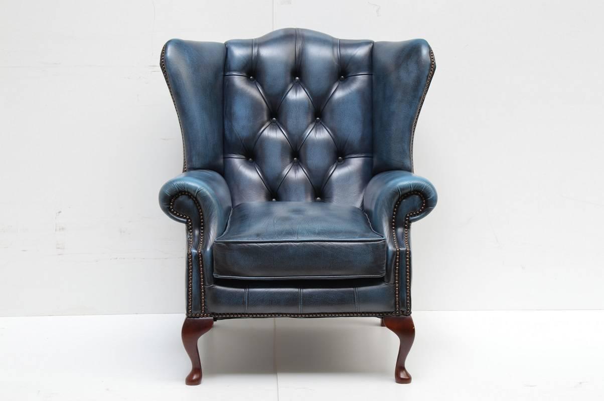 1989 made Chesterfield chair. Made in the United Kingdom for a Delta Chesterfield customer in the Netherlands. 

Former owner was very fund of this chair and kept it in very good condition. Nice detail is that the blue color has become a very nice