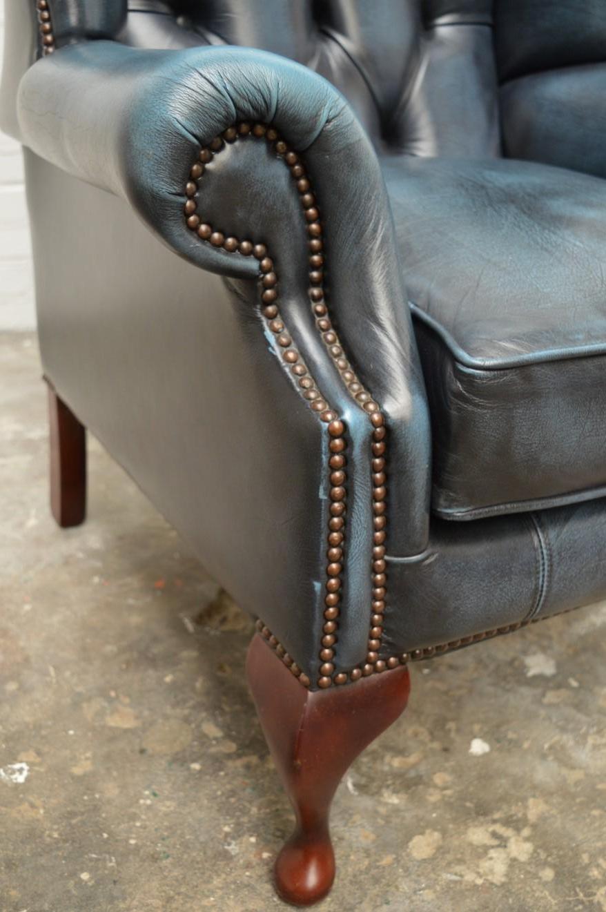 Late 20th Century Chesterfield High Back Wingchair in Antique Blue Leather For Sale