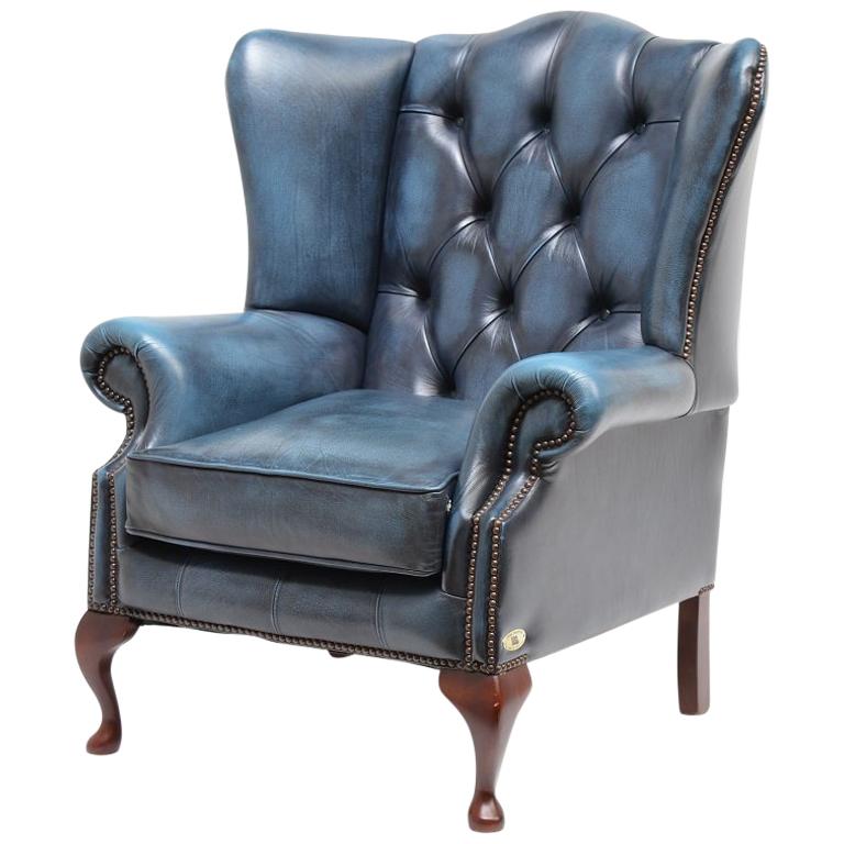 Chesterfield High Back Wingchair in Antique Blue Leather For Sale