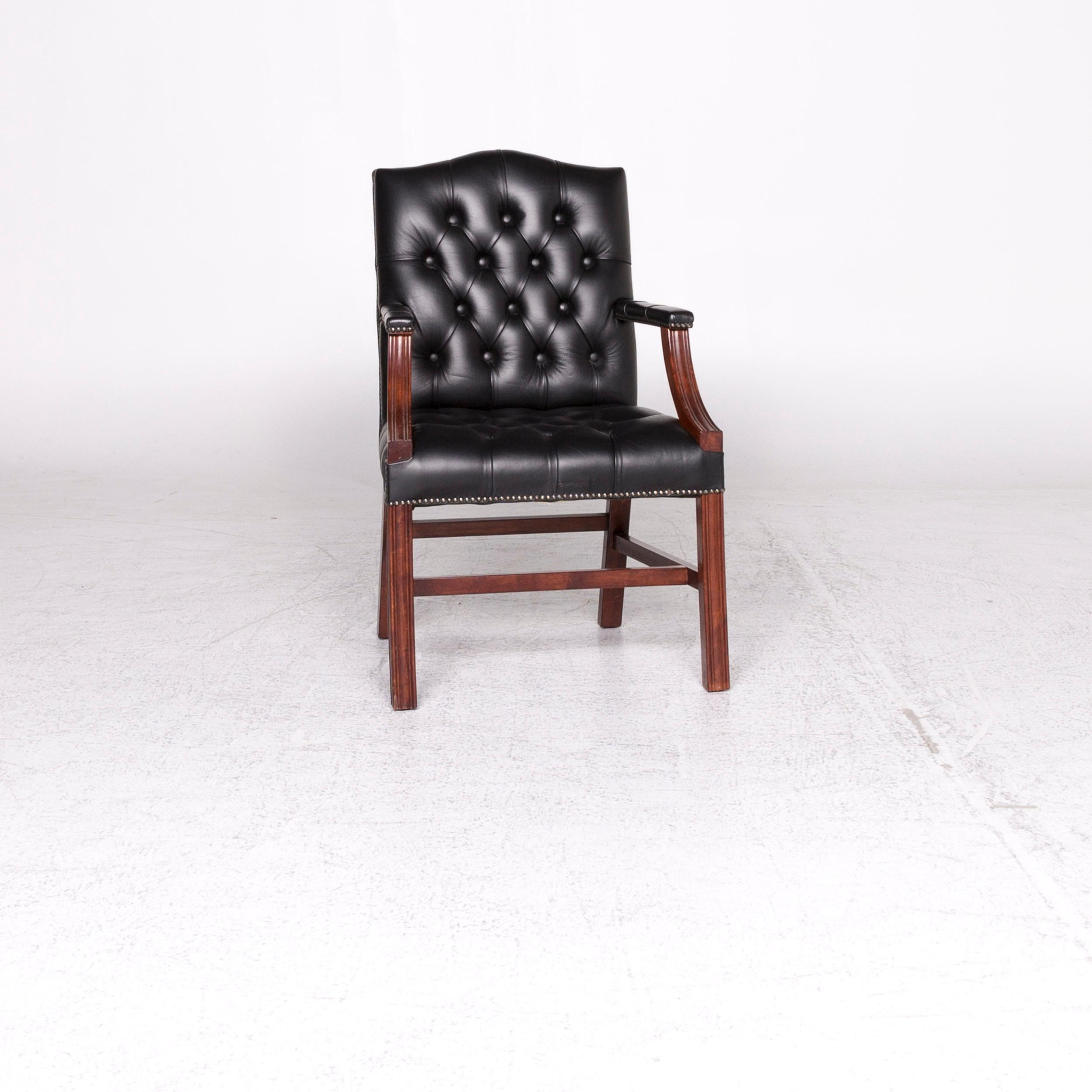 We bring to you a Chesterfield leather armchair black chair.
 
 Product measurements in centimeters:
 
 depth 63
 width 62
 height 100
 seat-height 49
 rest-height 69
 seat-depth 44
 seat-width 50
 back-height 51.
  