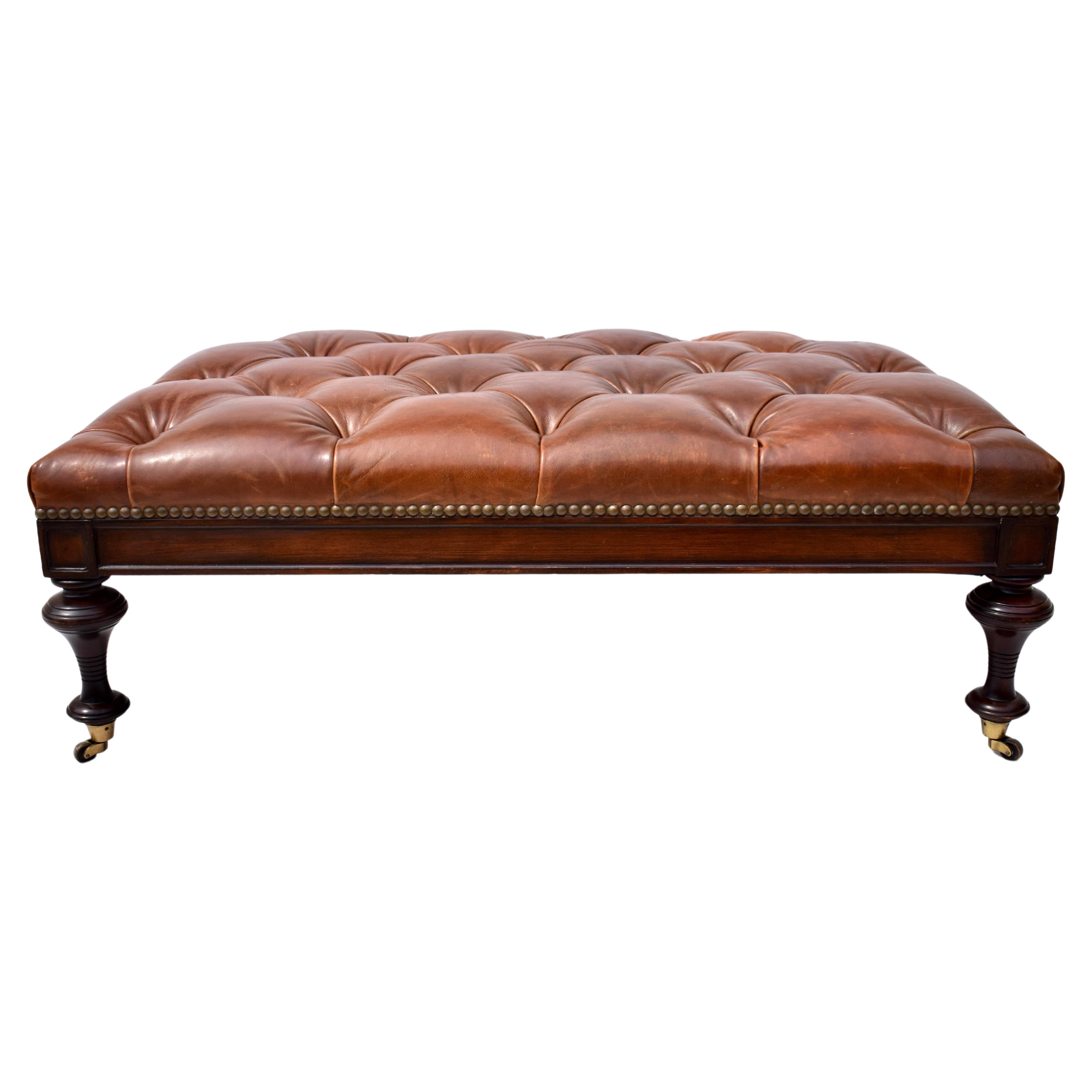 Chesterfield Leather Ottoman on Brass Casters by Drexel  For Sale