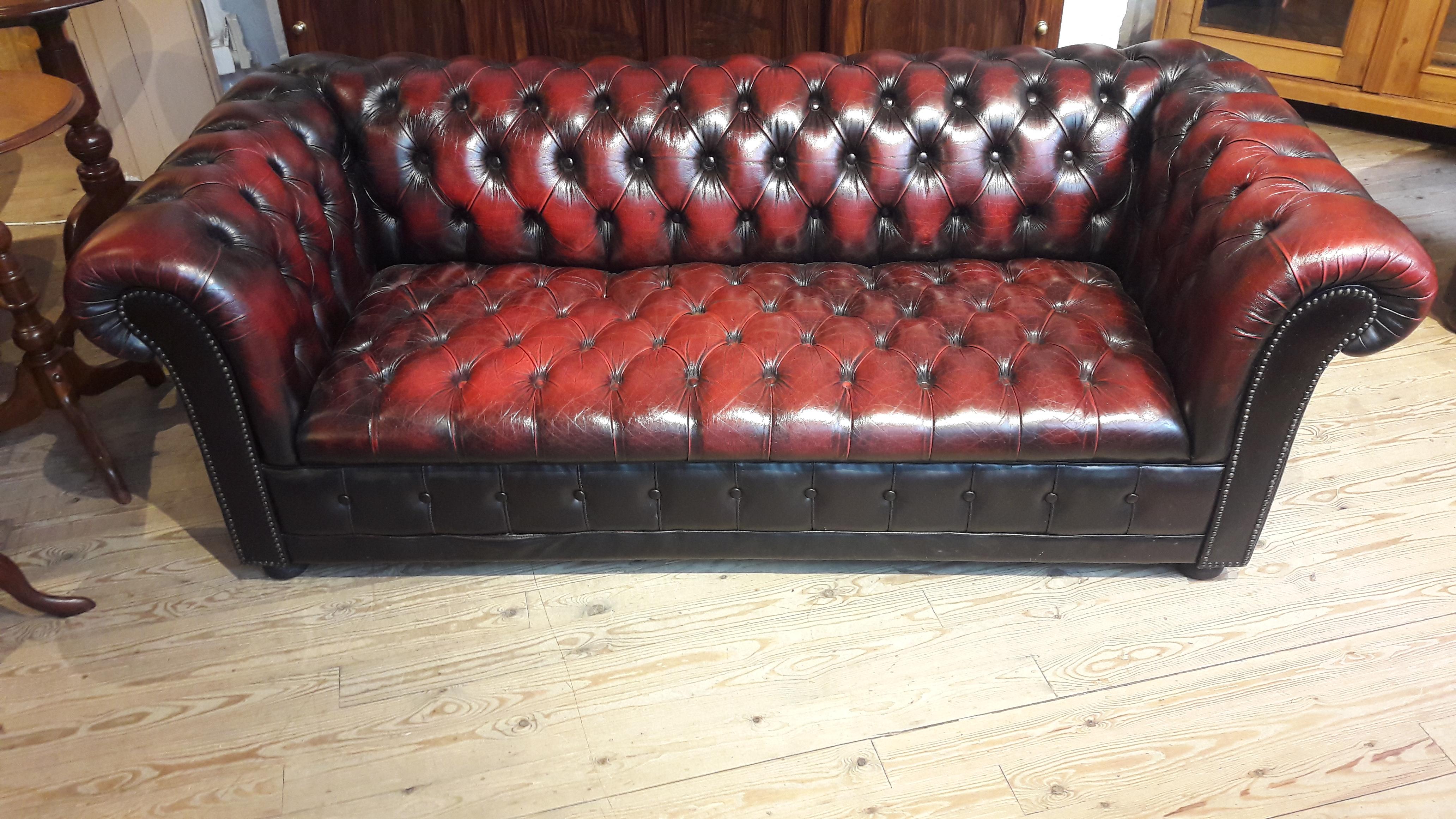 Great burgundy color chesterfield. A very comfortable three-seat sofa.