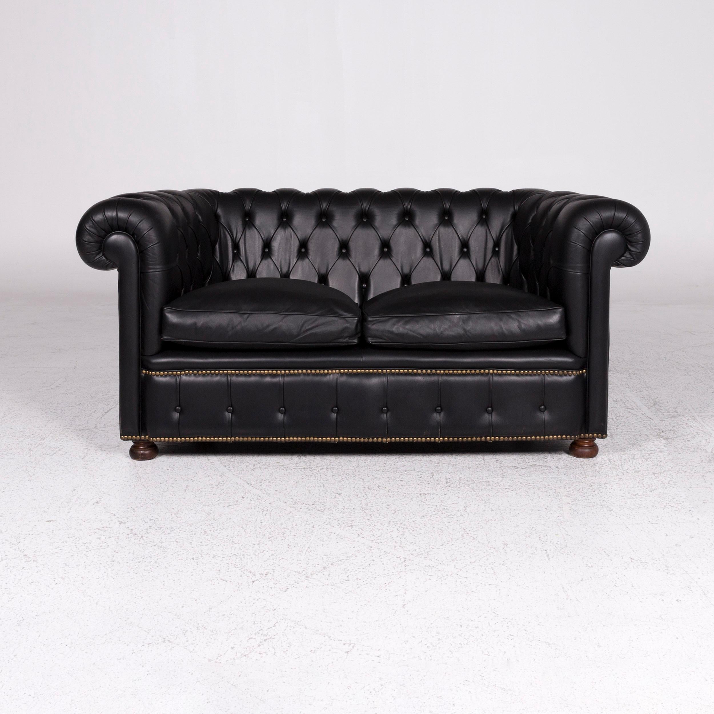 We bring to you a Chesterfield leather sofa gray two-seat retro couch.
 
 Product measurements in centimeters:
 
 Depth 91
Width 165
Height 75
Seat-height 51
Rest-height 76
Seat-depth 58
Seat-width 108
Back-height 29.
 
    