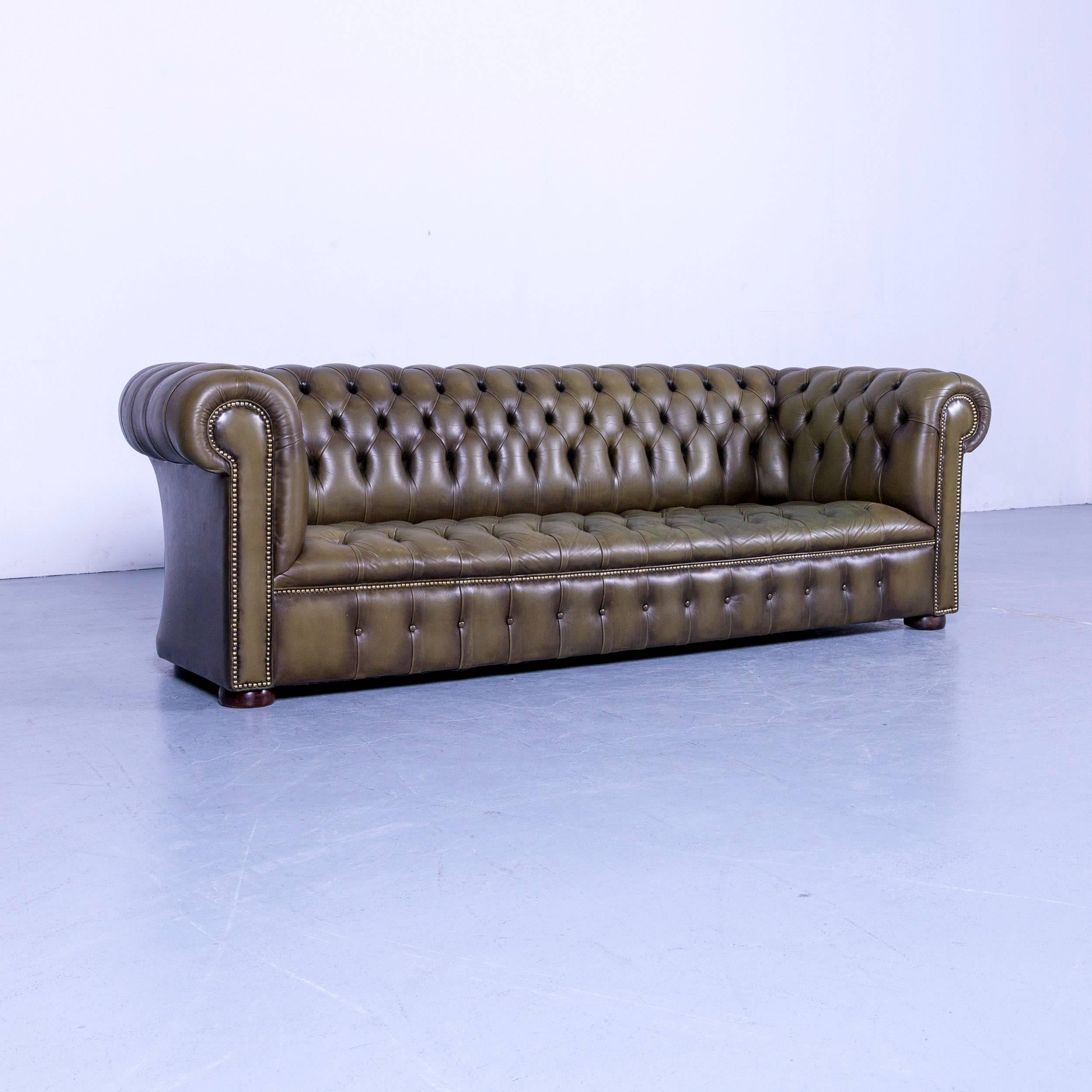 An Chesterfield leather sofa olive green couch vintage three-seat.




















 