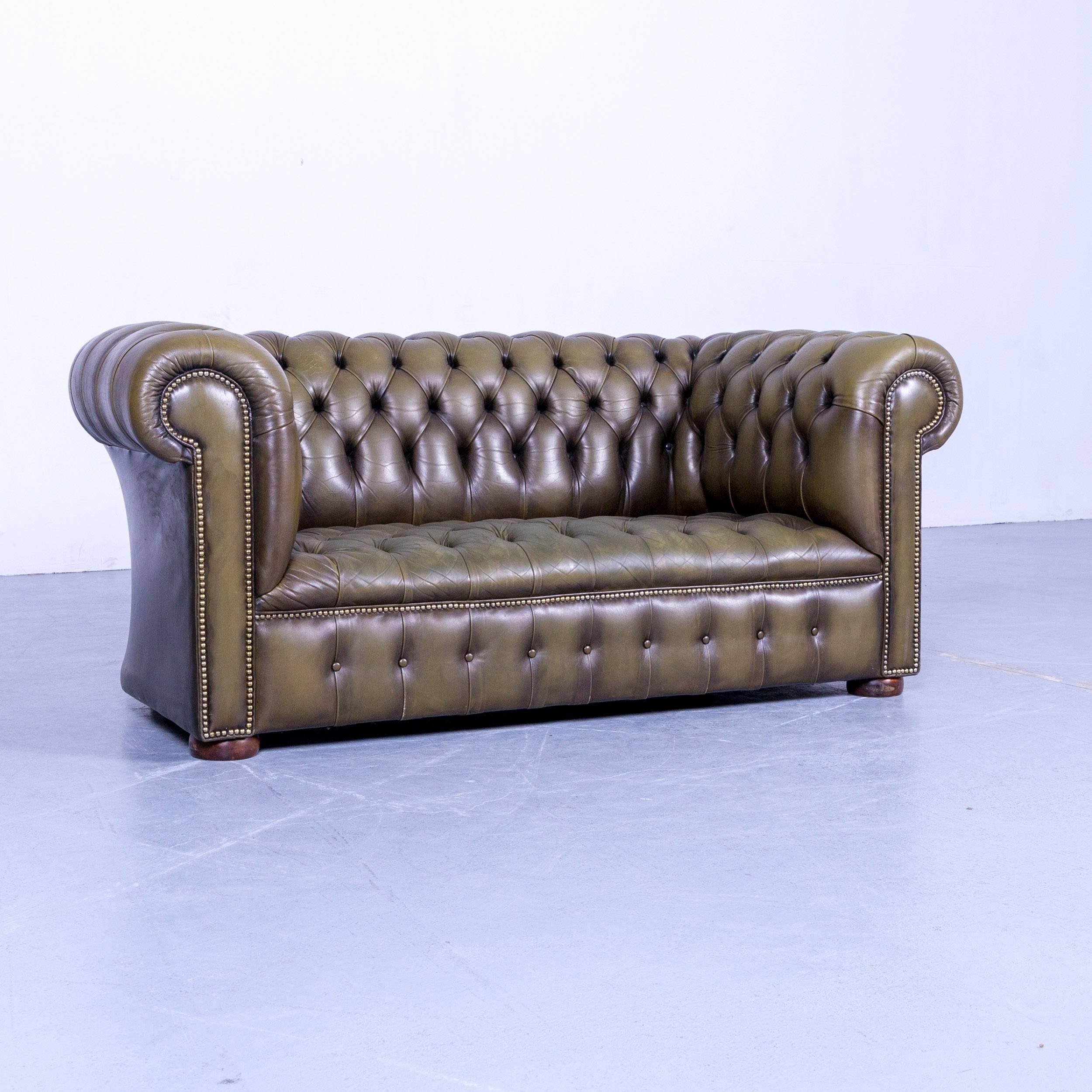 An Chesterfield leather sofa olive green couch vintage two-seat.




















 