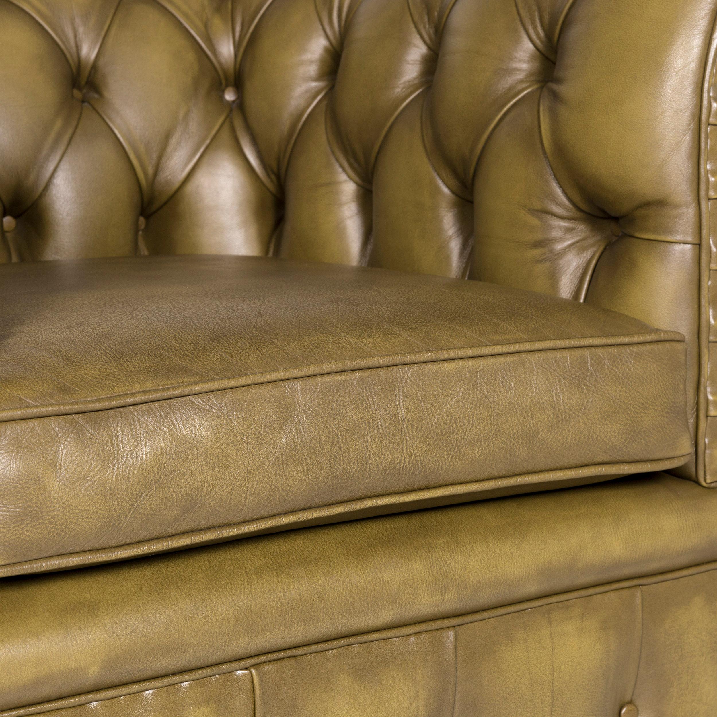 We bring to you a Chesterfield leather sofa olive green green retro vintage couch.
 
 Product measurements in centimeters:
 
Depth 93
Width 113
Height 77
Seat-height 48
Rest-height 75
Seat-depth 50
Seat-width 46
Back-height 37.
  