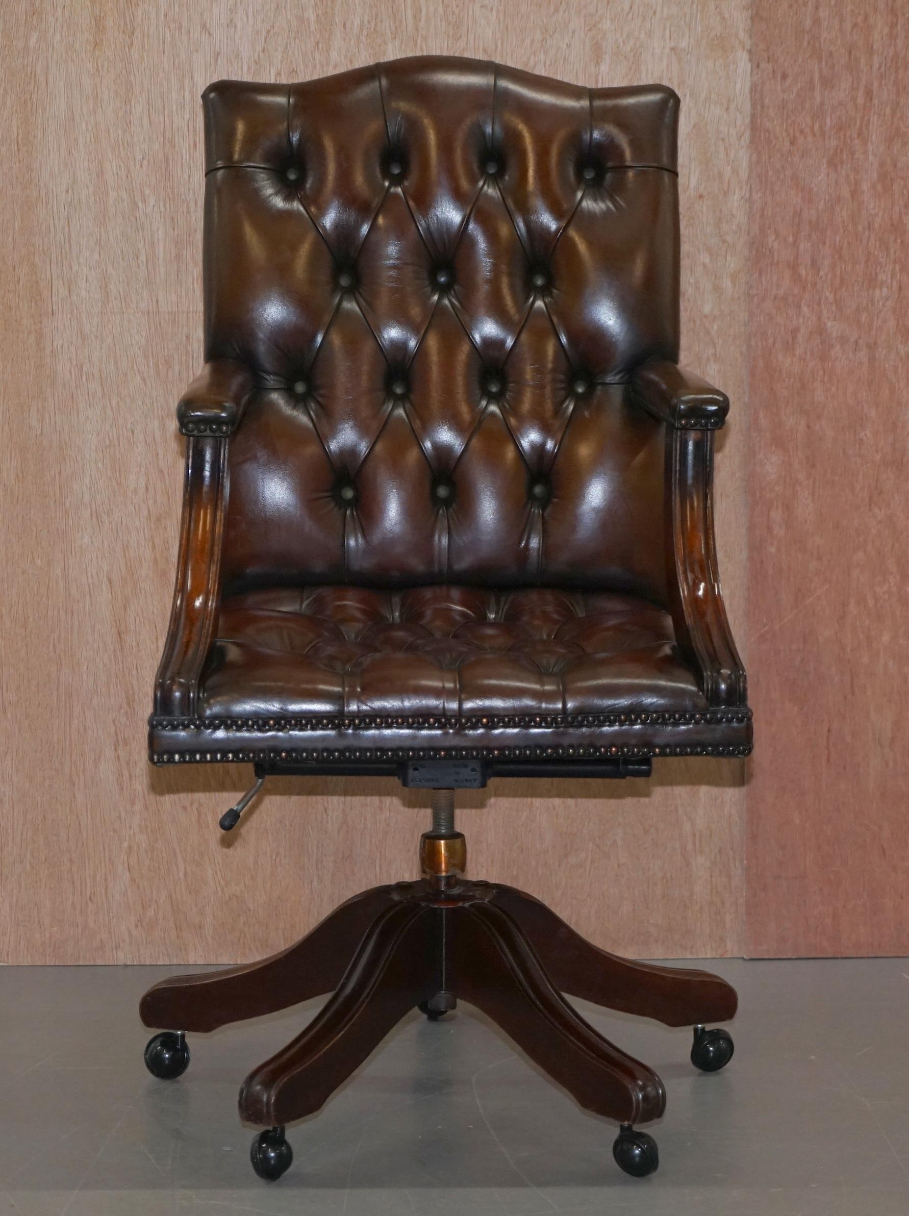 We are delighted to offer for sale this stunning original handmade in England fully restored hand dyed deep brown leather captains armchair

A stunning piece, the frame is solid and beautifully crafted mahogany, the leather is English cattle hide