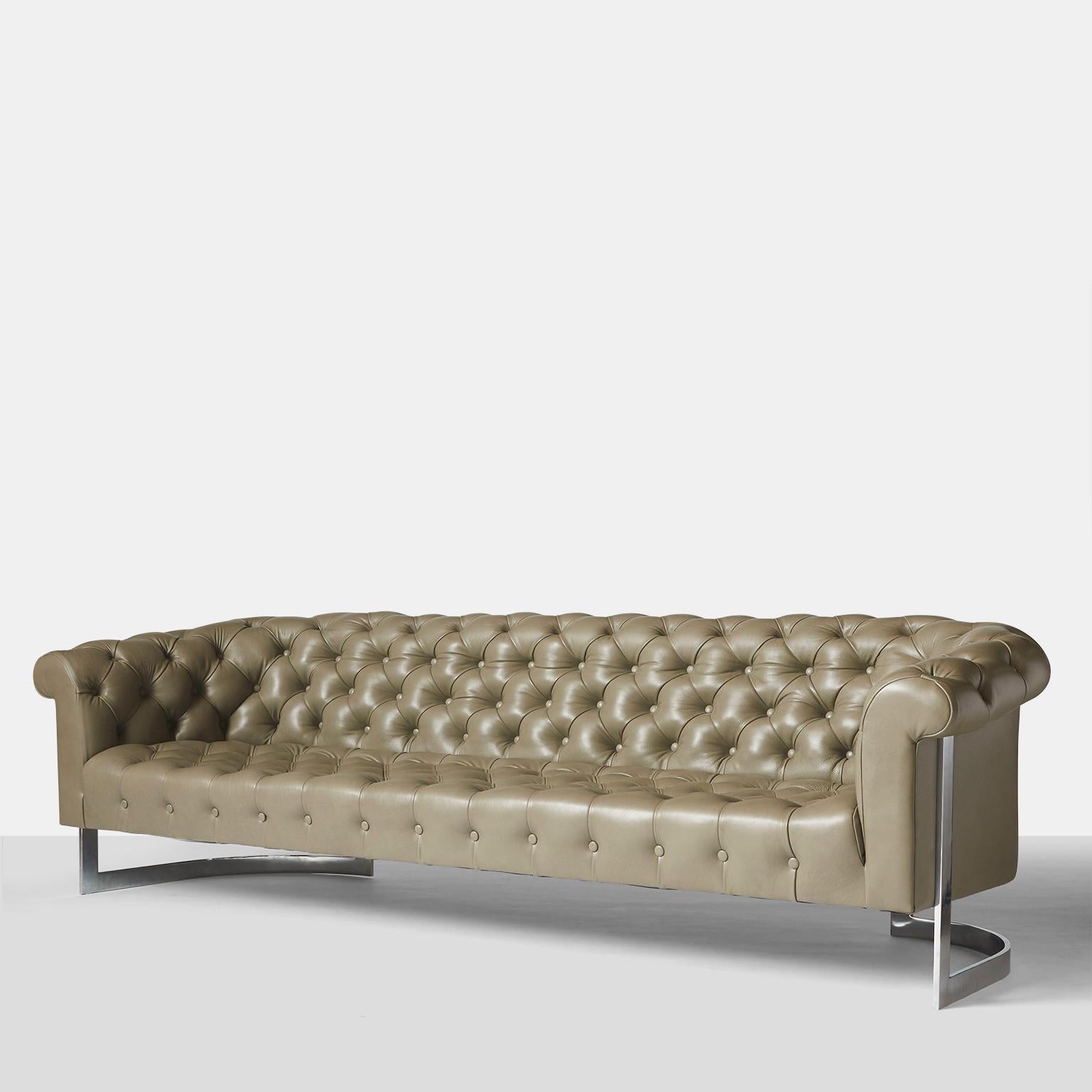 A Chesterfield sofa for Thayer Coggin circa early 1970s. Elegant, diamond tufted stone gray leather. Wrap around chrome plated steel back.
Excellent restored condition.
