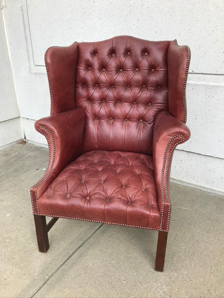 studded leather armchair