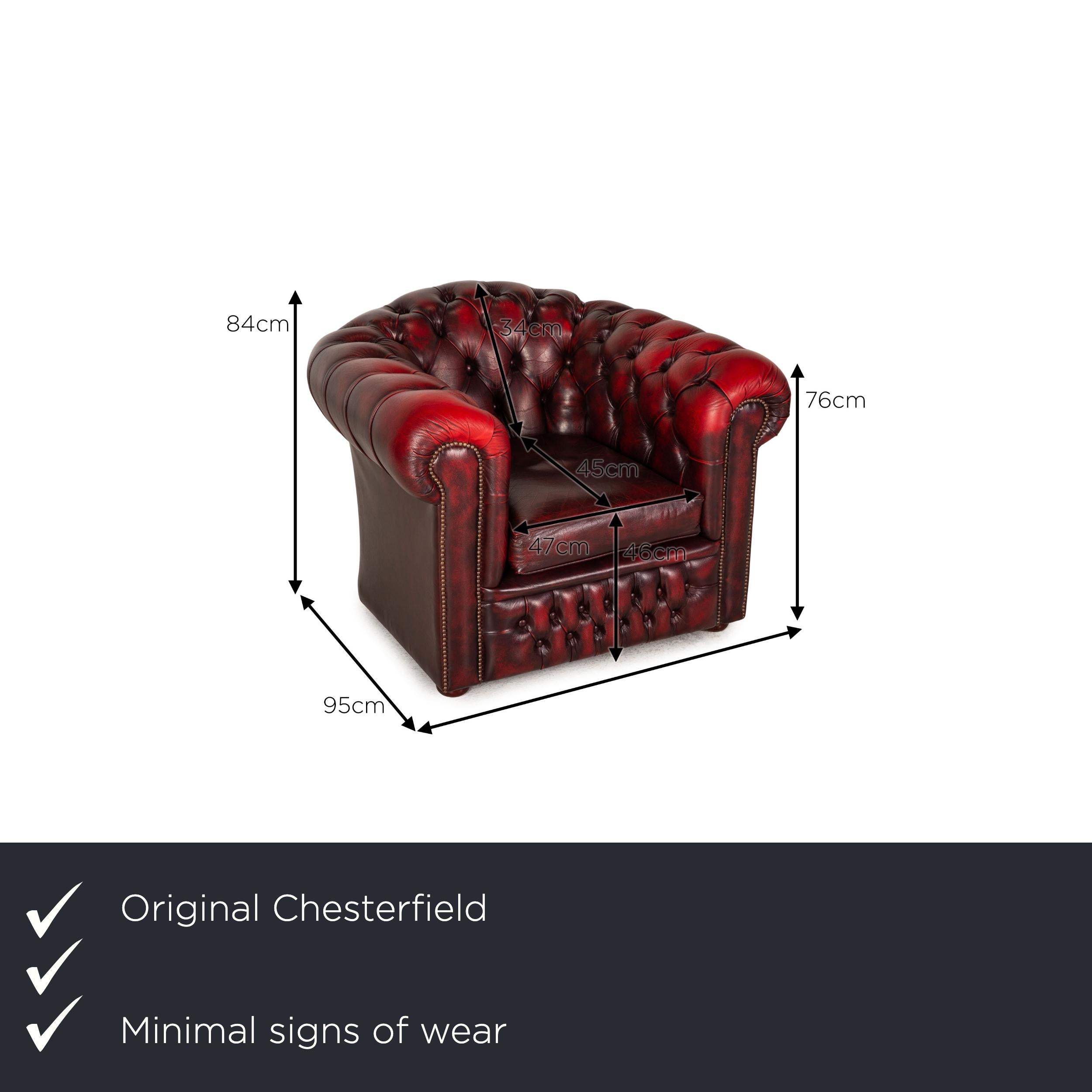 We present to you a Chesterfield Tudor leather armchair dark red.

Product measurements in centimeters:

Depth: 95
Width: 113
Height: 84
Seat height: 46
Rest height: 76
Seat depth: 45
Seat width: 47
Back height: 34.
    
   