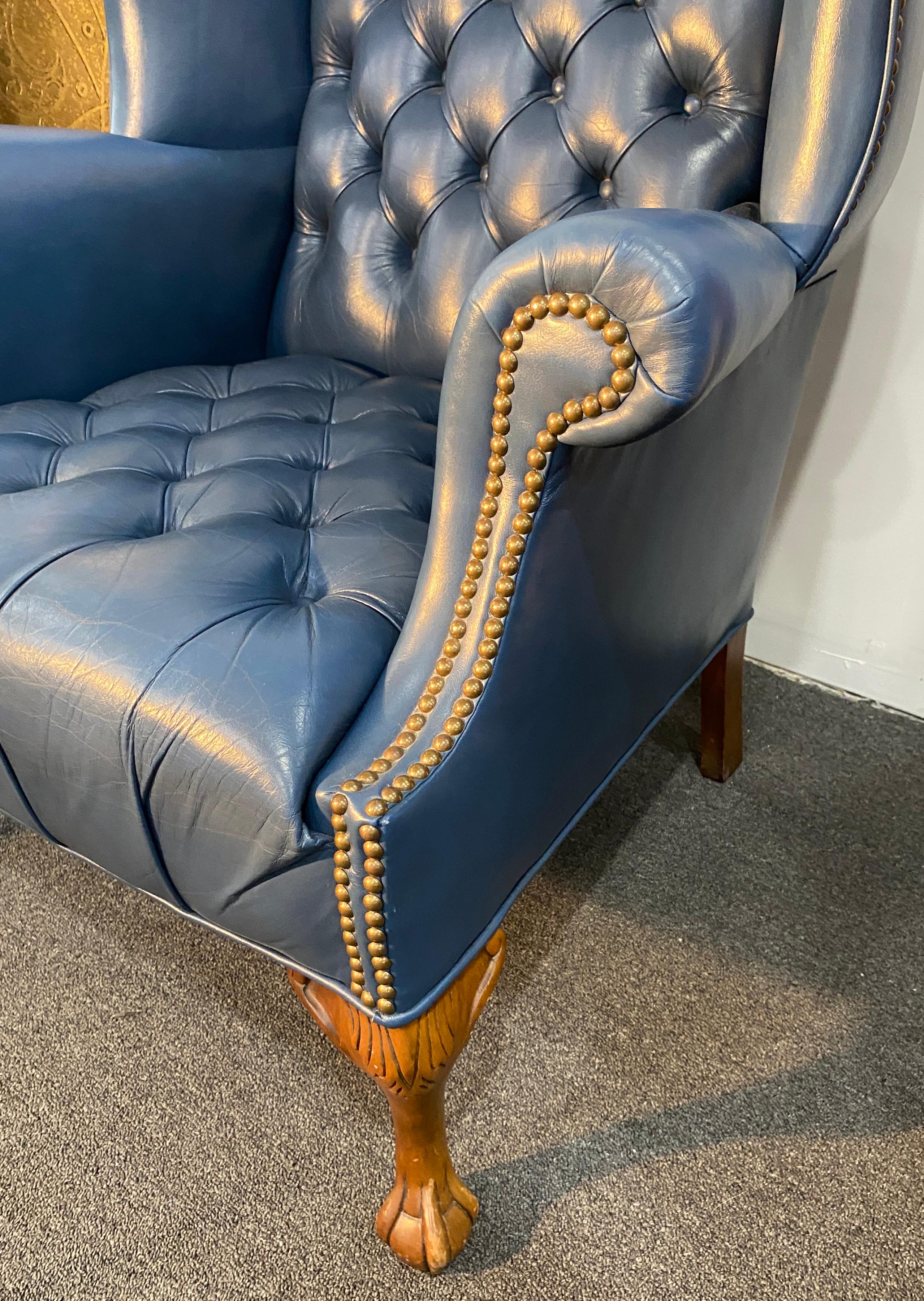 A fine quality and lovely Chesterfield style hand dyed slate blue leather library club reading armchair with ottoman. 

A great looking and decorative pair with a lovely Victorian Gentleman’s club look and feel. This Chesterfield Tufted Slate Blue