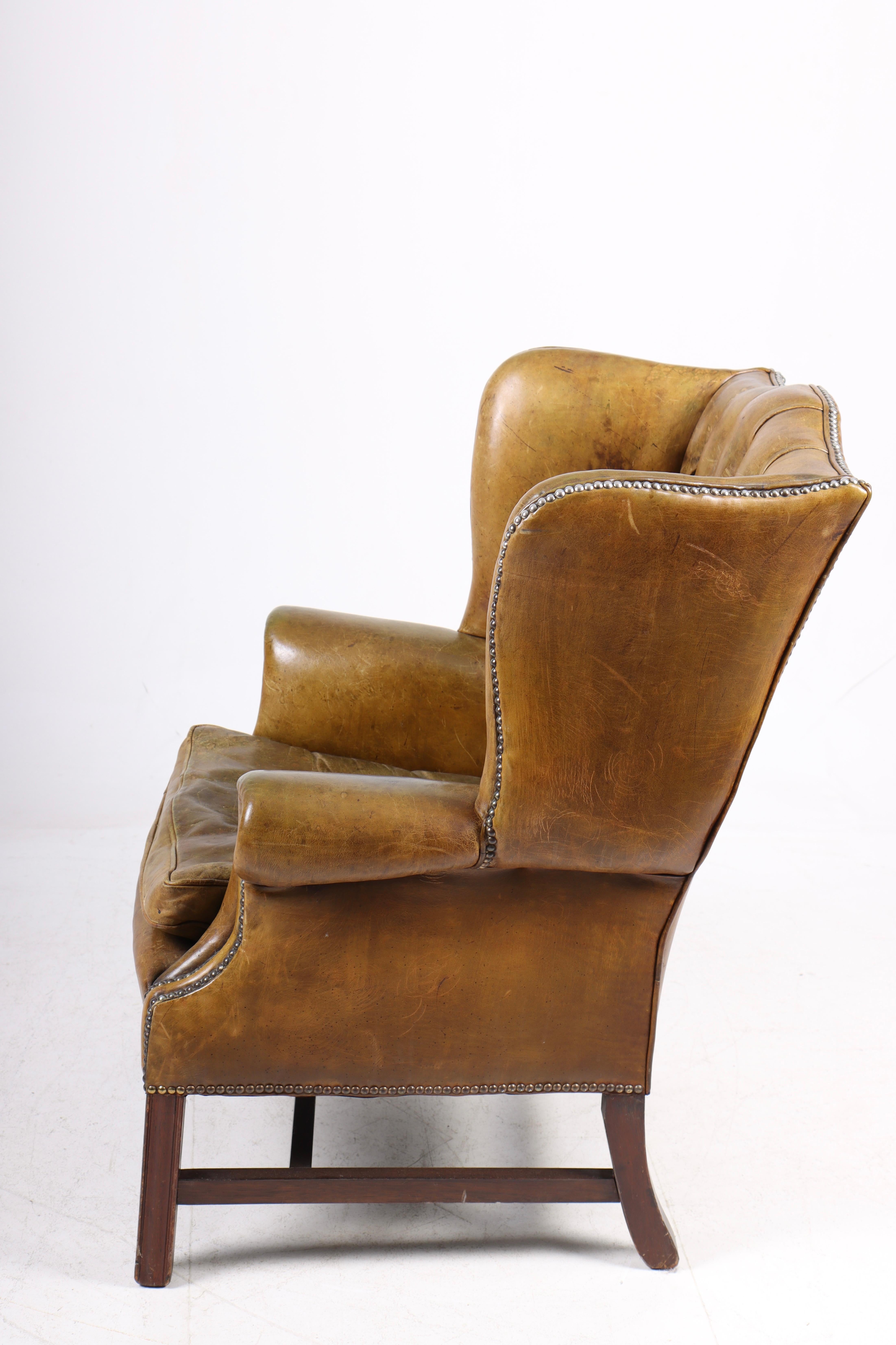 Mid-20th Century Chesterfield Wingback Chair in Leather, Made in Denmark 1950s For Sale