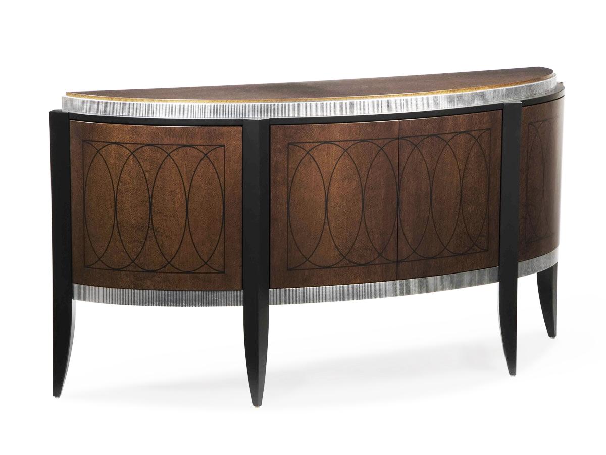 The Argentine sideboard has a beautiful chestnut birdseye maple facade with oval black line detailing with silver leaf & black micro-groove detailing at bottom. All four doors open to reveal one continuous adjustable shelf. Fitted with a chestnut