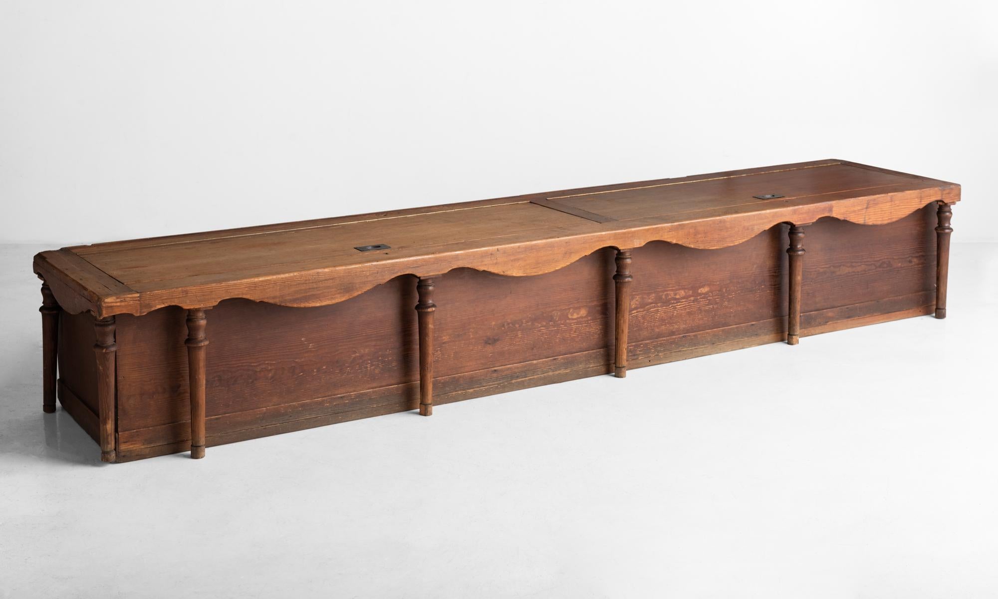 Chestnut Boat Bench, America, circa 1900.

With baluster supports, brass hardware, and storage underneath.

Measures: 104.5