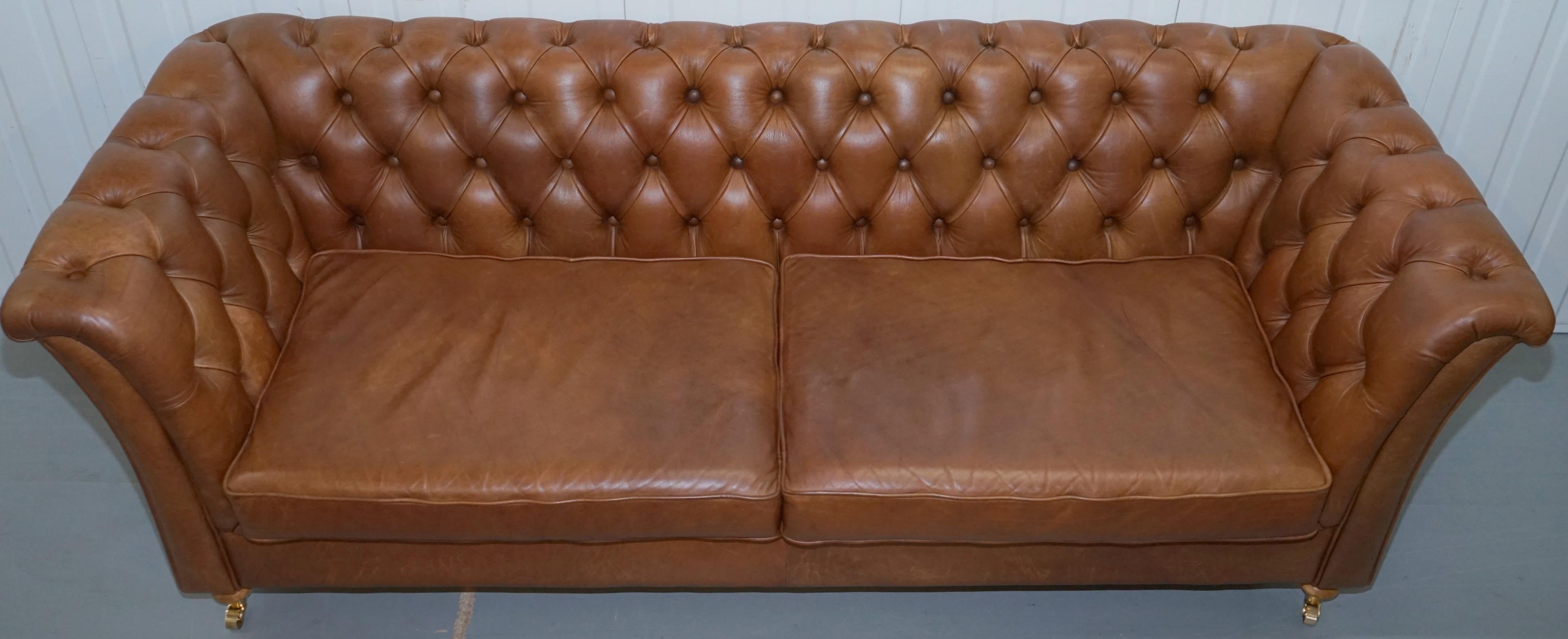 English Chestnut Brown Leather Chesterfield Sofa with Turned Oak Legs and Castors
