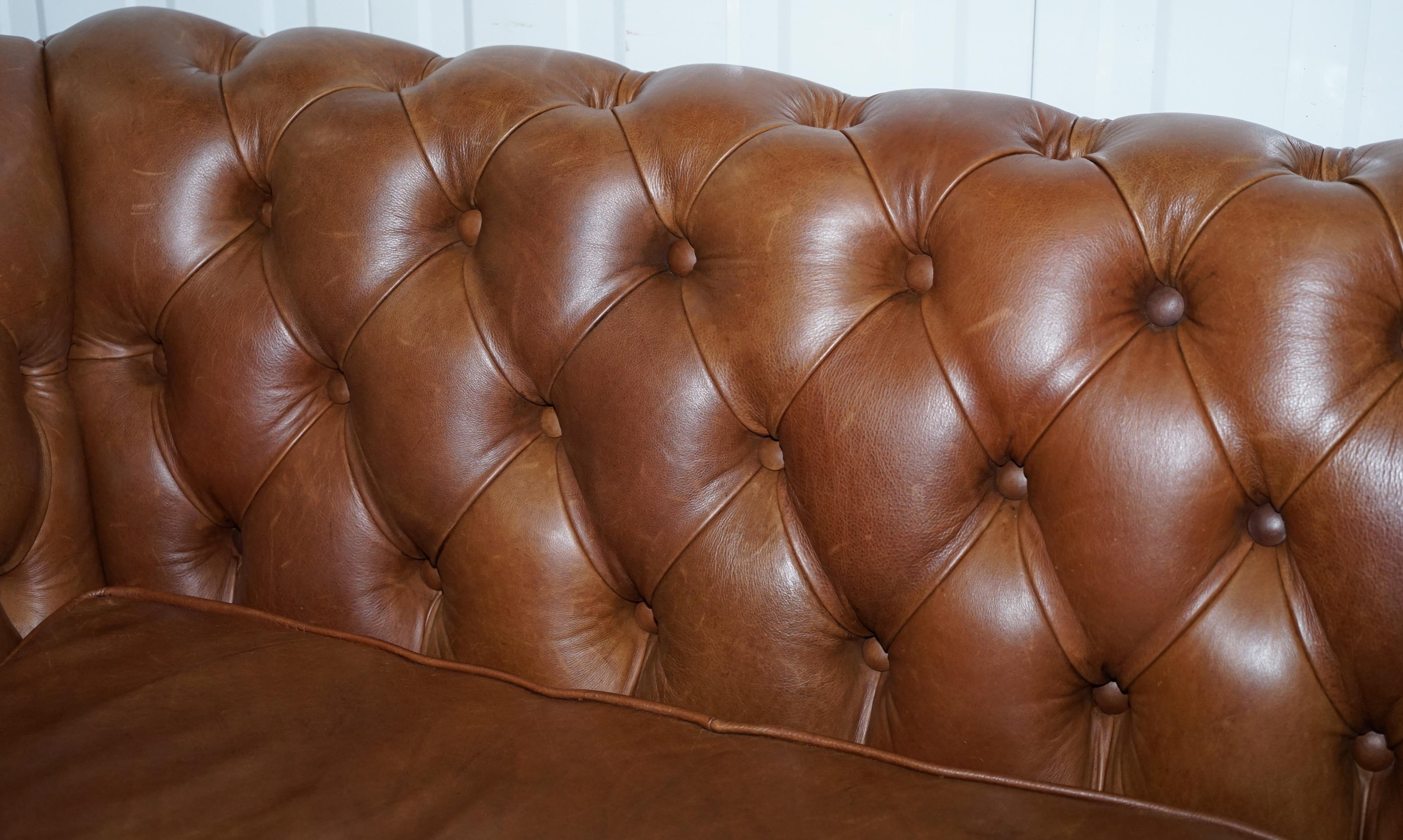 Hand-Carved Chestnut Brown Leather Chesterfield Sofa with Turned Oak Legs and Castors