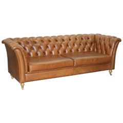 Chestnut Brown Leather Chesterfield Sofa with Turned Oak Legs and Castors