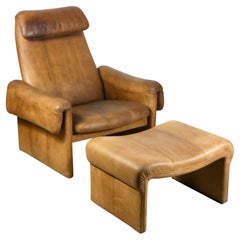 Sedia da salotto in pelle marrone con pouf di Kill International, anni '60