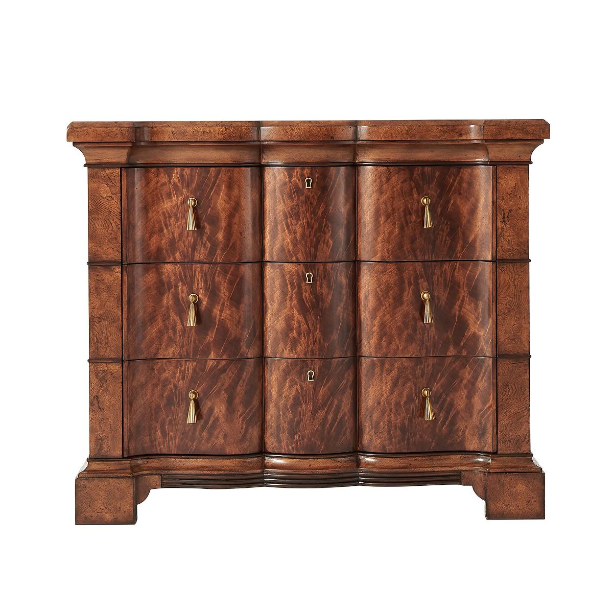 A Chestnut Burl veneered and flame mahogany nightstand, the serpentine flame mahogany veneered top above three flame mahogany veneered serpentine drawers with drop handles and escutcheons, on a molded base with bracket feet.

Dimensions: 36