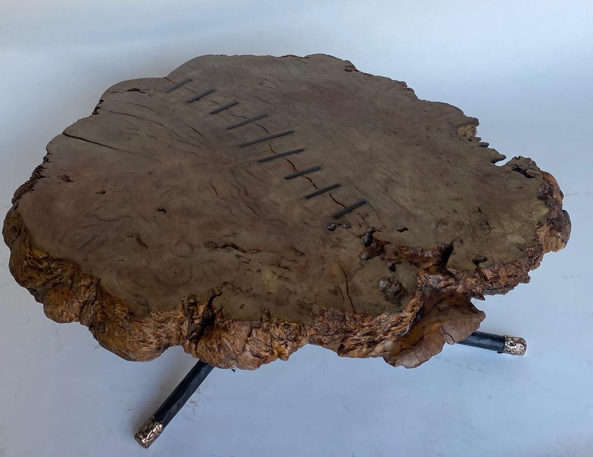 Chestnut Burled Cocktail Table with Bronze Tipped Legs and Iron Inlaid Spine In Good Condition In Los Angeles, CA