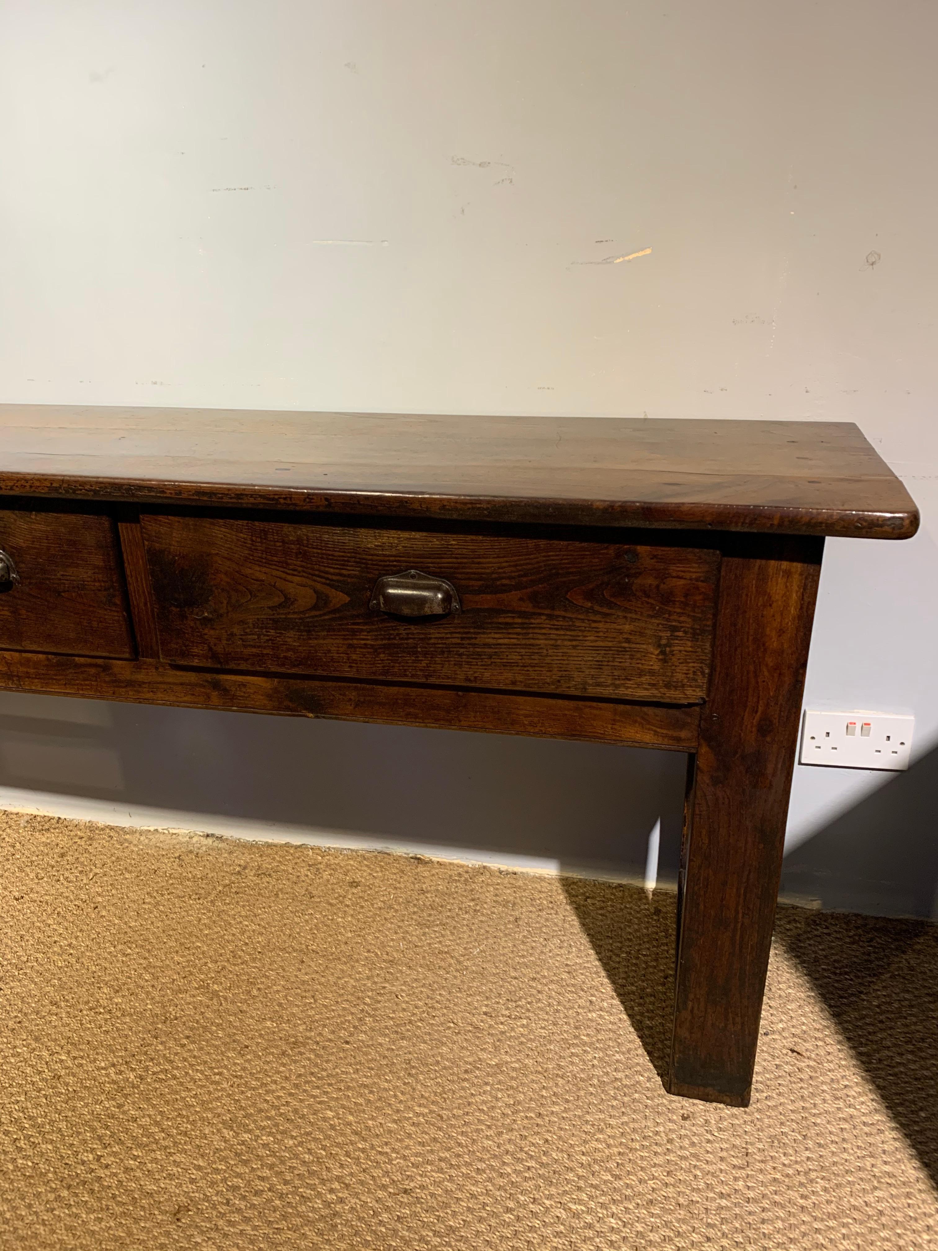 Great 19th century chestnut dresser base, dating to circa 1870s with 3 good size drawers with original handles , can free stand if needed as polished on all sides

This piece has been through our workshops, been cleaned and polished and is ready