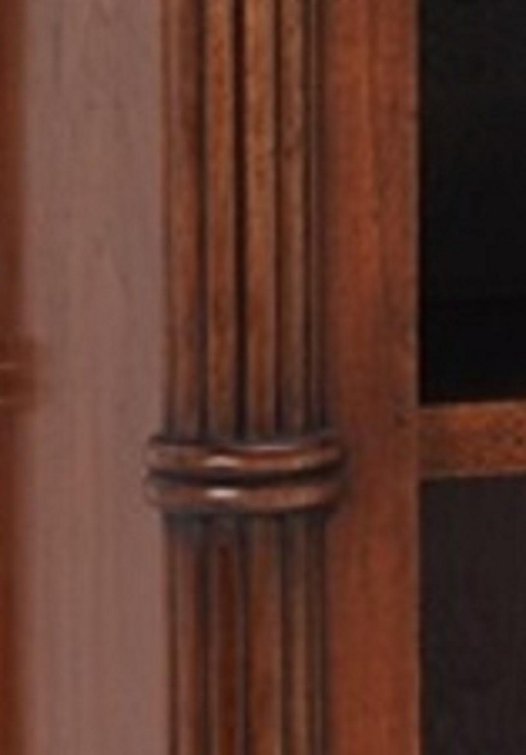 A Regency style mahogany open bookcase with reeded central end pilasters and adjustable shelves, all resting upon elegant torpedo design feet. Bespoke sizing, design adaptations and finishing available. Please note we are currently working to a