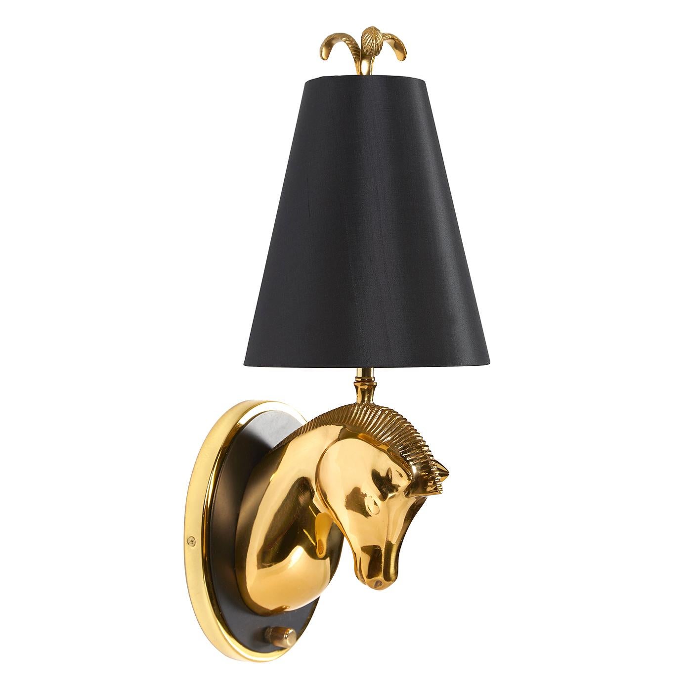 Show Pony. Brimming with equestrian flair, classic French style meets a pared-down mod vibe. Topped with a black silk shade and brass feather finial, our Cheval Sconce is sure to win best in show. Add a luxe layer to your library or a dose of drama