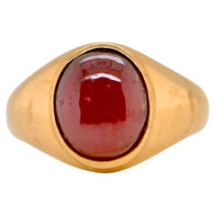 Chevalière Adorned with an 18 Carat Gold Garnet