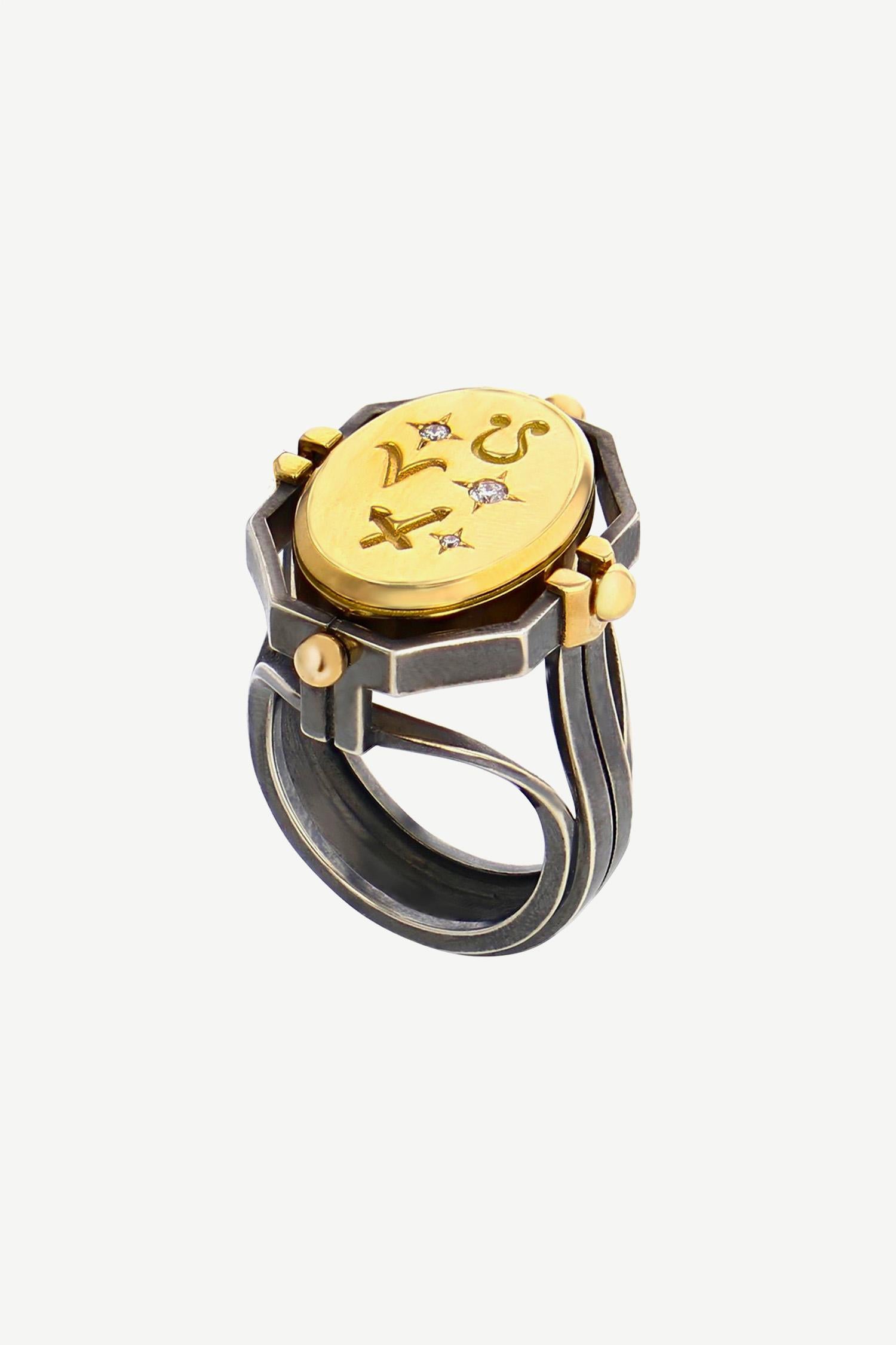 Yellow gold and distressed silver ring. Rotating medallion: on the gold side are engraved Fire signs (Sagittarius, Leo, Aries) and on the carnelian, a salamander.

Details:
Carnelian 
3 Diamonds: 0.06 cts
18k Yellow Gold: 10g
Distressed Silver: