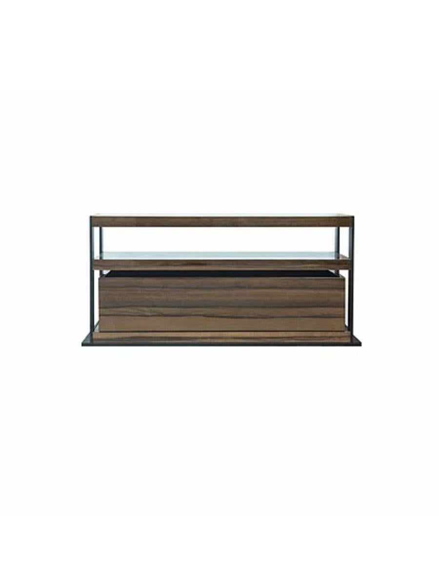 Chevet barte small low cabinet by LK Edition
Dimensions: 117 x 55 x H 52 cm
Materials: Exotic wood with glossy varnish and black metal. 
Also available in different sizes and finishes.

It is with the sense of detail and requirement, this