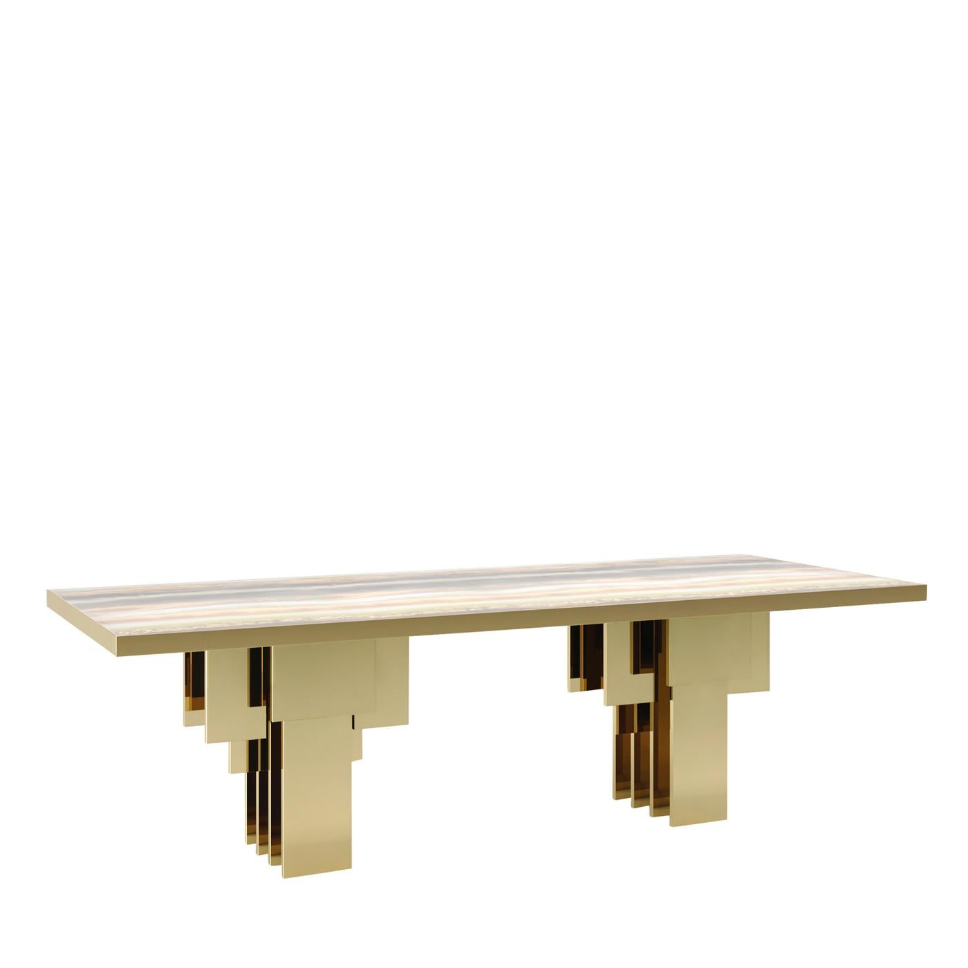 An exquisitely eccentric design characterizes this one-off dining table. Its top displays an inlaid wood structure that is widely customizable in other wood finishes or lacquers, while the support metal basement has a brass finish and comprises two
