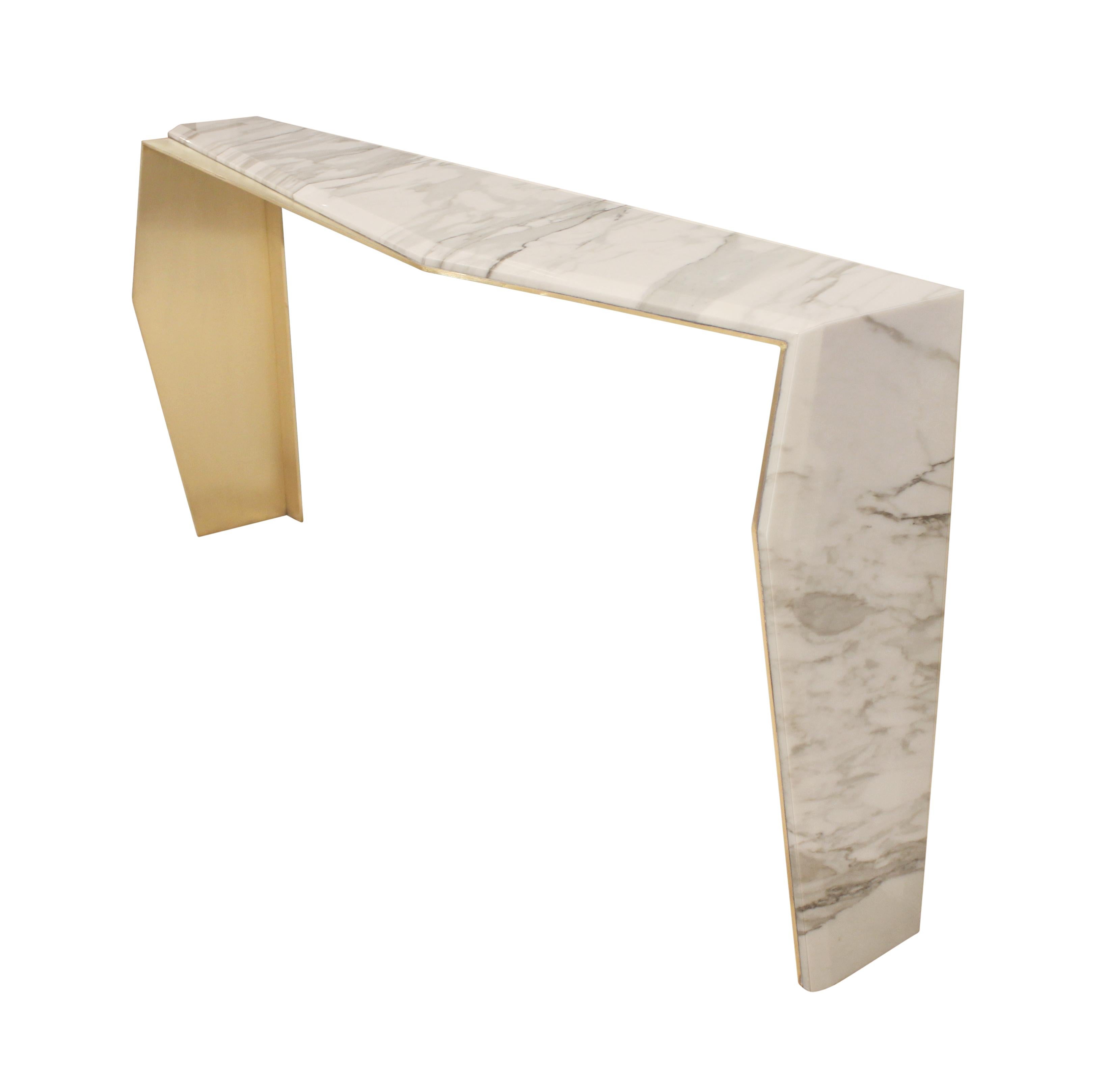 Dramatic brass console table clad in calacatta gold marble. Custom sizes, finishes, and materials available.
 