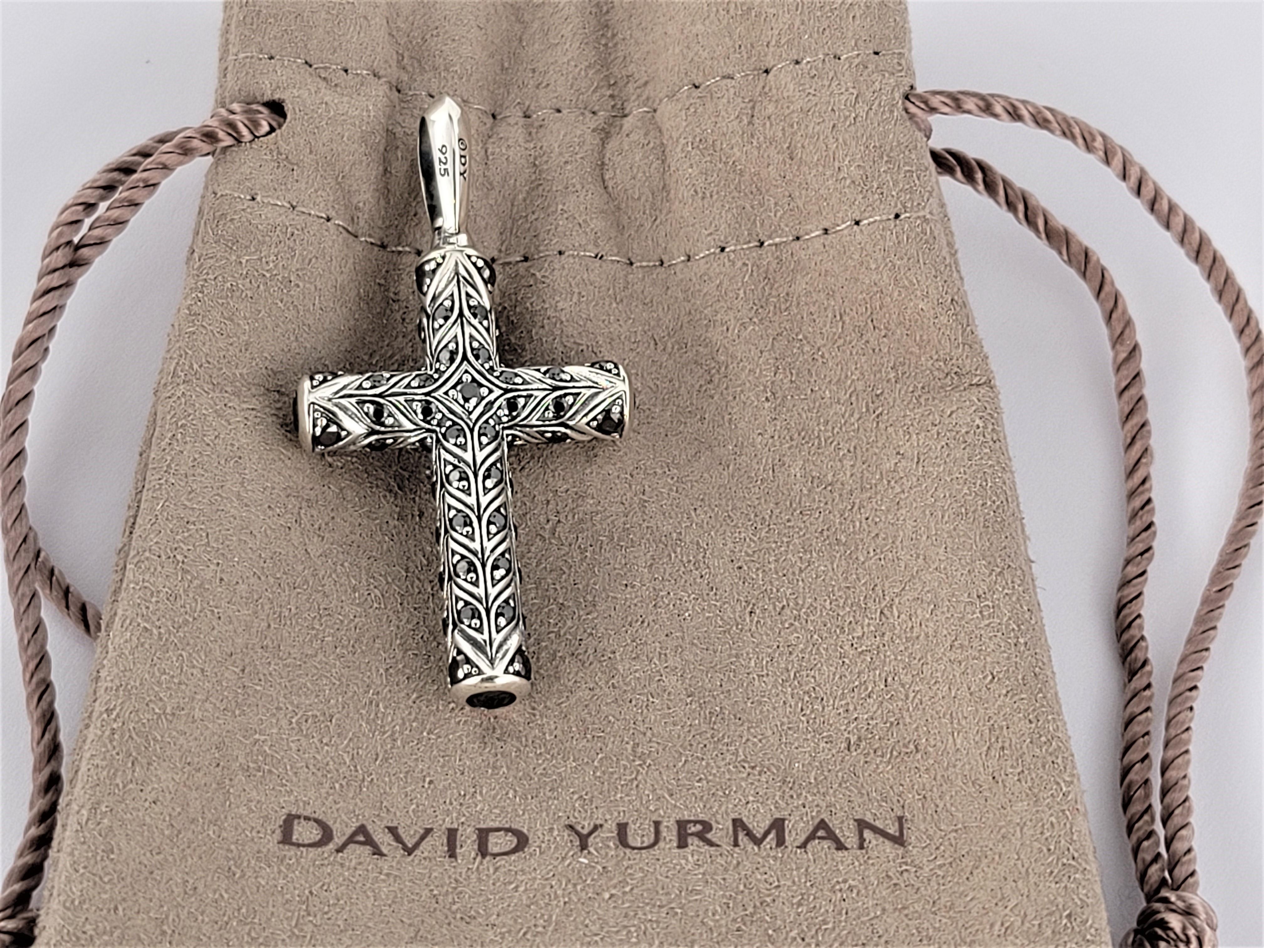 Brand David Yurman
Chevron Collection for Men
Pave Set black diamonds 1.80 total carat weight 
Material Sterling Silver 
metal Purity 925
Cross Length with Bail 45 X 23.7mm
Cross Weight 10.7gr 
Condition new, never worn
Comes with David Yurman