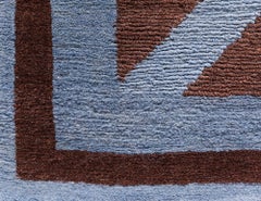 Tapis « Chevron », création de Sandra Nunnerly, dans des tons marron et bleu ardoise