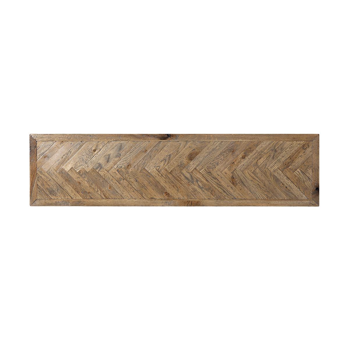 Chevron Modern console table, with a chevron oak parquetry top above a dark oak solid base with stretcher.

Dimensions: 60