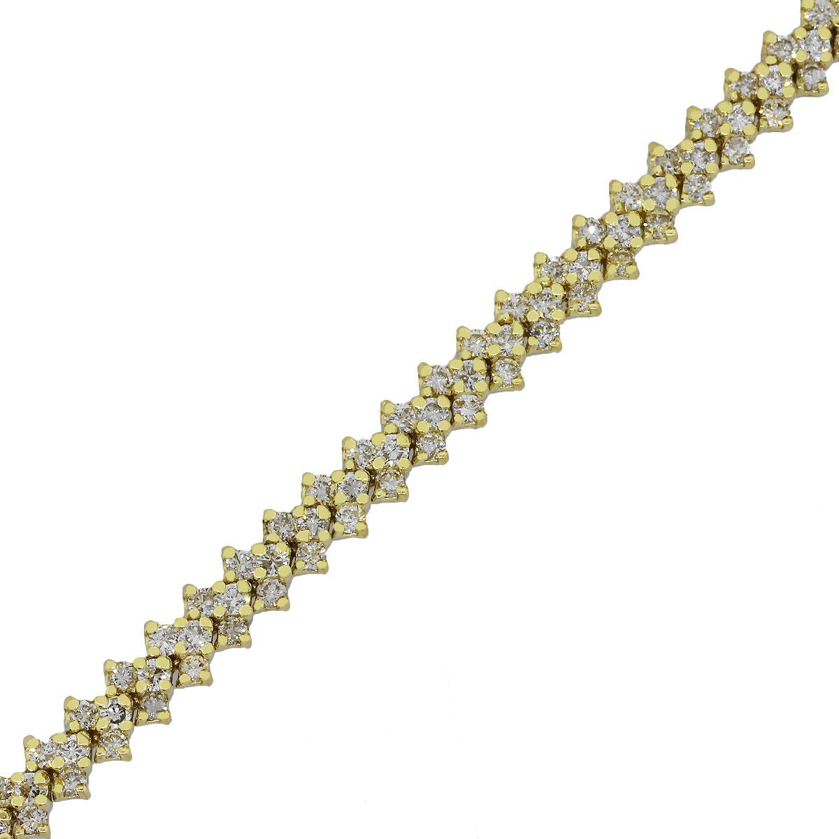 Material: 14k Yellow Gold
Diamond Details: Approximately 3ctw round brilliant diamonds. Diamonds are H/I in color and VS-SI in clarity.
Clasp: Tongue in box with safety latch
Measurements: 7” x 0.20” x 0.15”
Total Weight: 16g (10.2dwt)
SKU: G8560