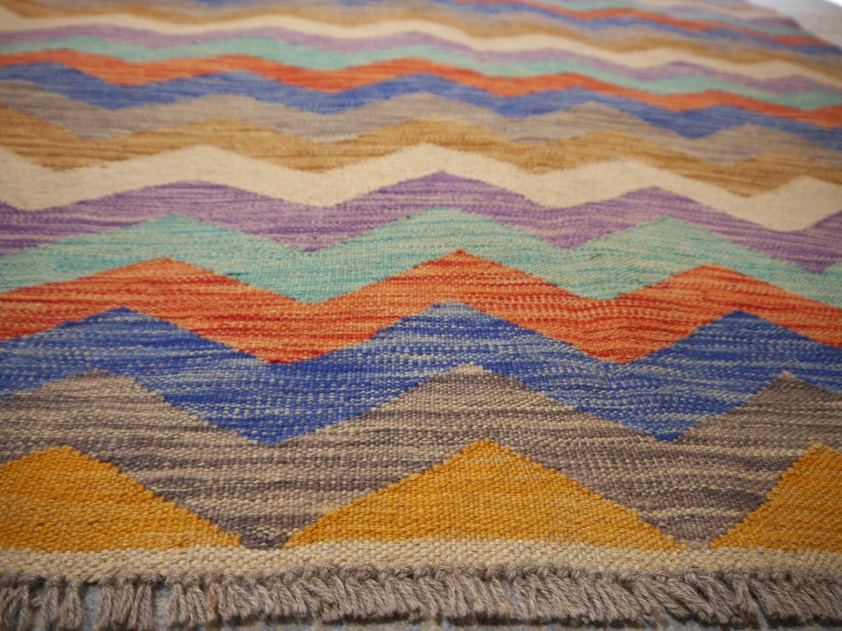 Arijana Kilim Rug hand-woven carpet
Arijana Kilim rugs are made by tribes in southern Afghanistan close to the Pakistan border.
Arijana carpets are of high quality. This Kilim Rug was hand woven with natural pigment dyed wool, the Zig Zag Design