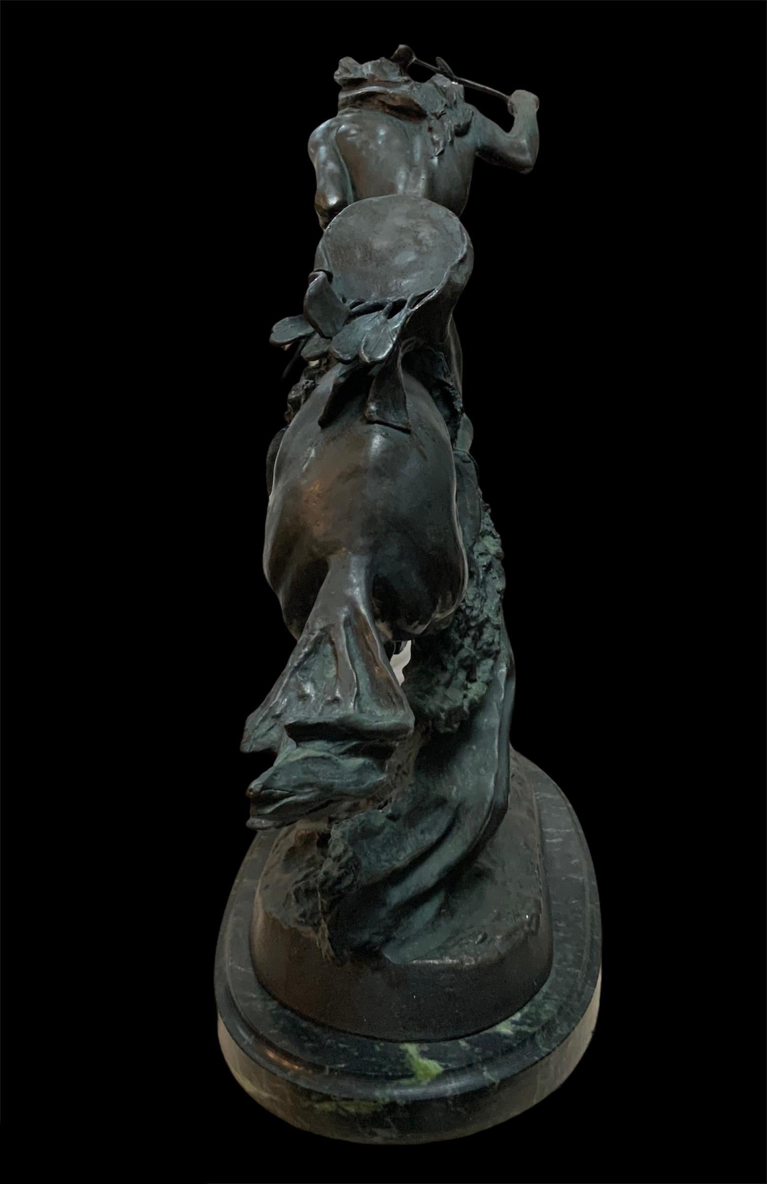This is a patinated bronze sculpture of a Native American riding his horse over a buffalo robe saddle by Frederic Remington. It depicts a strong Native American wearing a loincloth and moccasins while his horse is breaking into a furious gallop. He