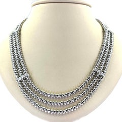Collana Chiampesan in oro bianco 18 carati con tre file di diamanti, 0,20 carati