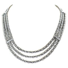 Collana Chiampesan in oro bianco 18 carati con tre file di diamanti, 0,20 carati