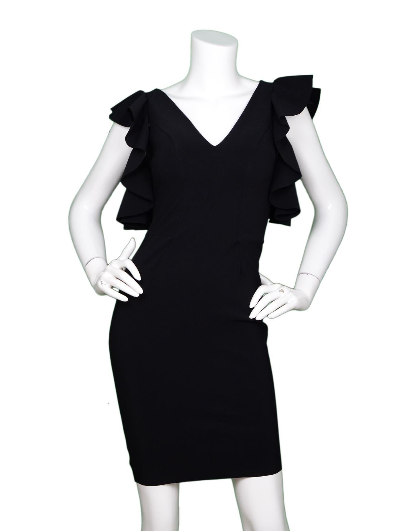 Chiara Boni Black Dress W/ Ruffle Sleeves Sz 4

Made In:   Italy
Color: Black
Materials: 72% polyamide, 28% elastane 
Opening/Closure: Pull over
Overall Condition: Excellent pre-owned condition 

Measurements: 
Shoulder To Shoulder:  13