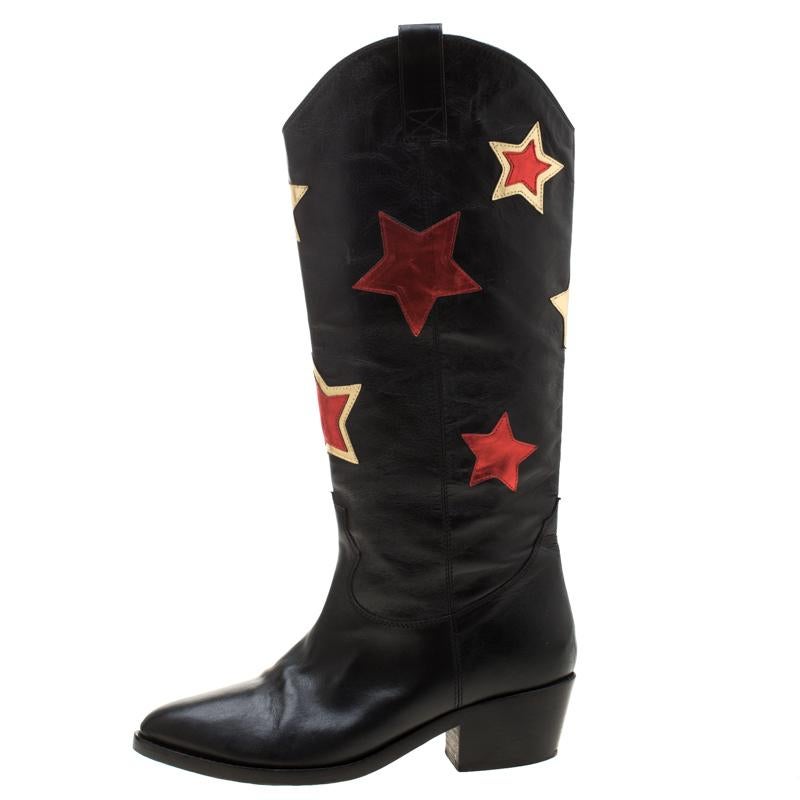 This season get these leather boots for yourself and take your fashion quotient a few notches higher. Enhance your style with these trendy leather sole boots. They are designed in a cowboy-style with star appliques on the exterior.

