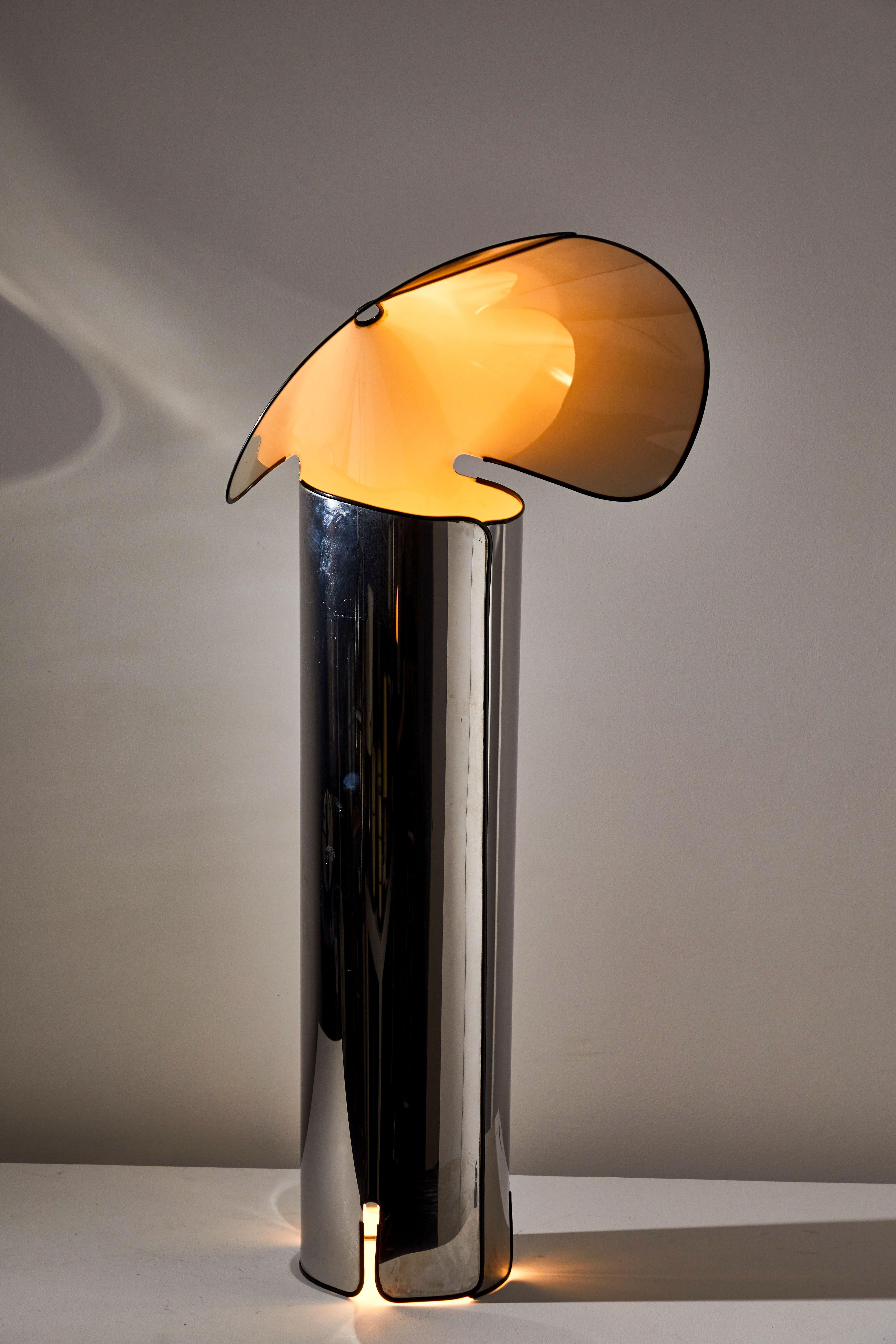 Chiara floor lamp by Mario Bellini for Flos. Designed in 1964 and manufactured in Italy, 1967. Chrome plated metal, enameled metal. Takes one E27 100w maximum bulb. Original European cord. Bulbs provided as a one time courtesy.