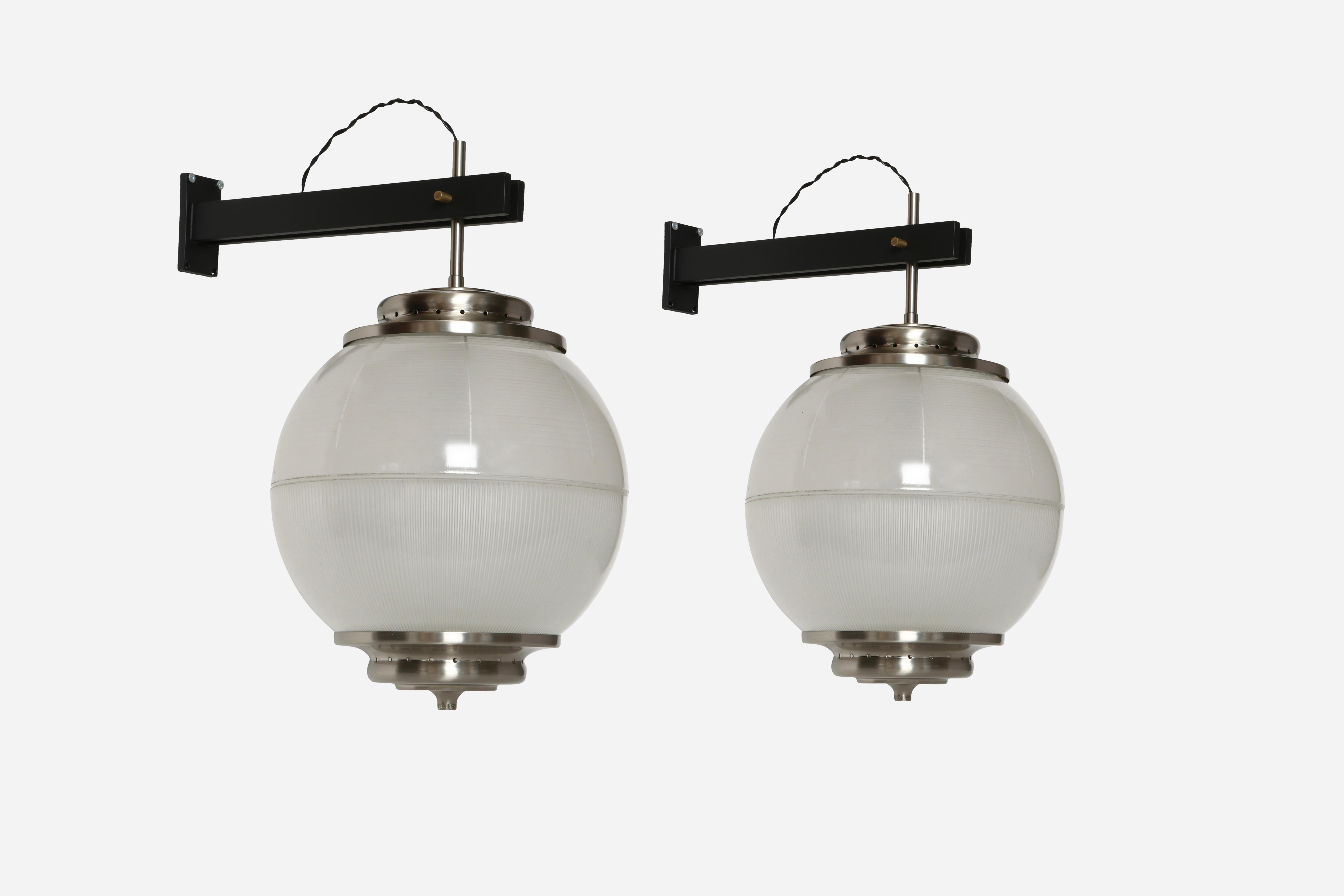 Wall lights by Chiaravallotti model A/567.
Designed and made in Italy, 1950s.
Holophane glass, nickel plated brass, enameled metal.
Take 3 candelabra bulbs each.
Fully restored.
Complimentary US rewiring with custom made brass backplates upon