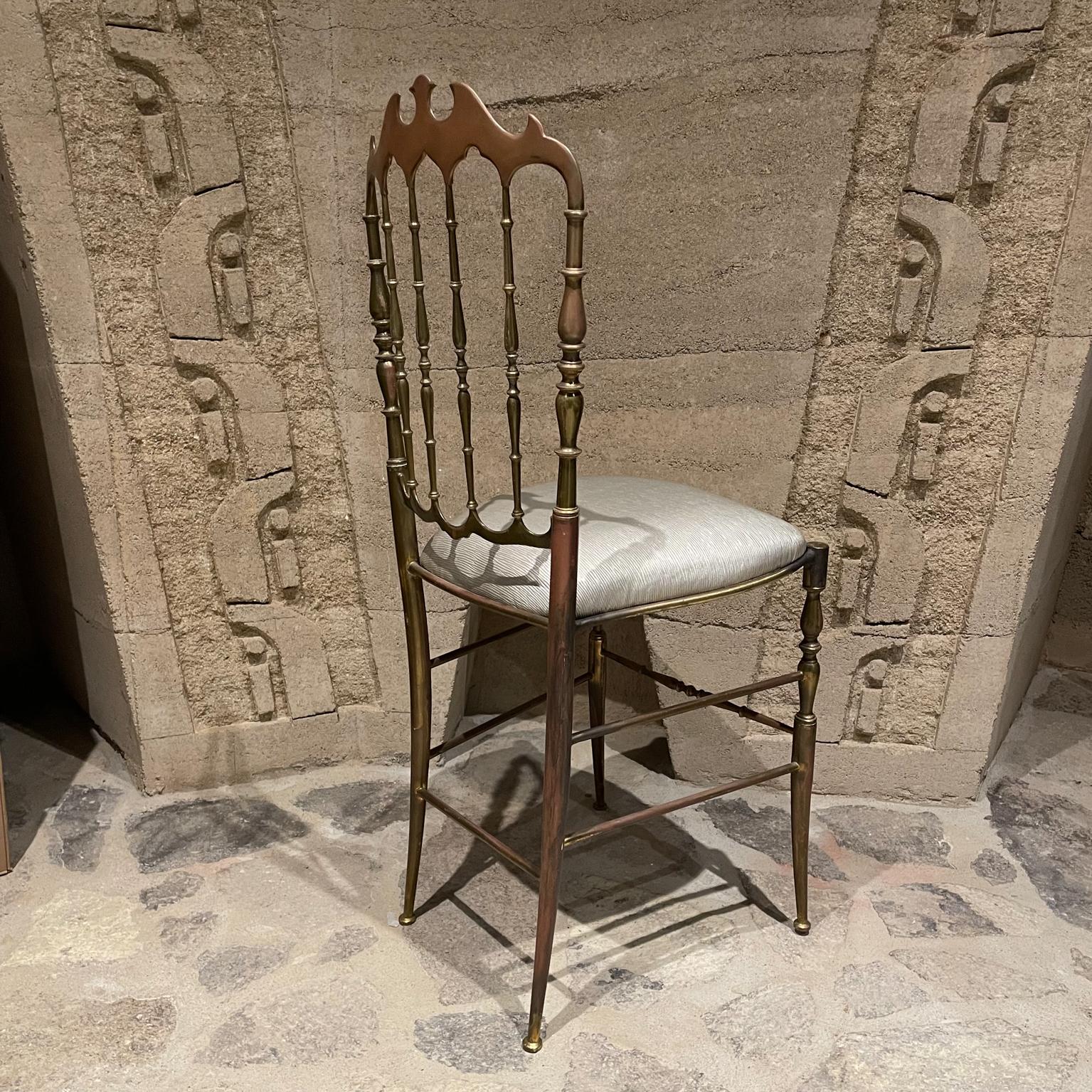 1950s Chiavari Chair in Bronze Italy
patinated bronze sophisticated upholstery in light gray.
36 H x 15 W x 14 D Seat 19.75 H inches
Original Unrestored Vintage condition. New upholstery.
See images provided.
Delivery to LA OC PS


    