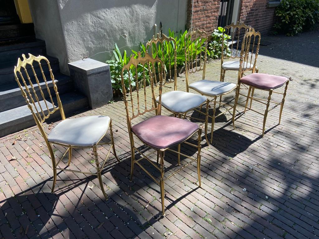 Chiavari chairs in brass, Italy, circa 1970.
Set of 6 with some minor differences. Easy upholstery of your choice.