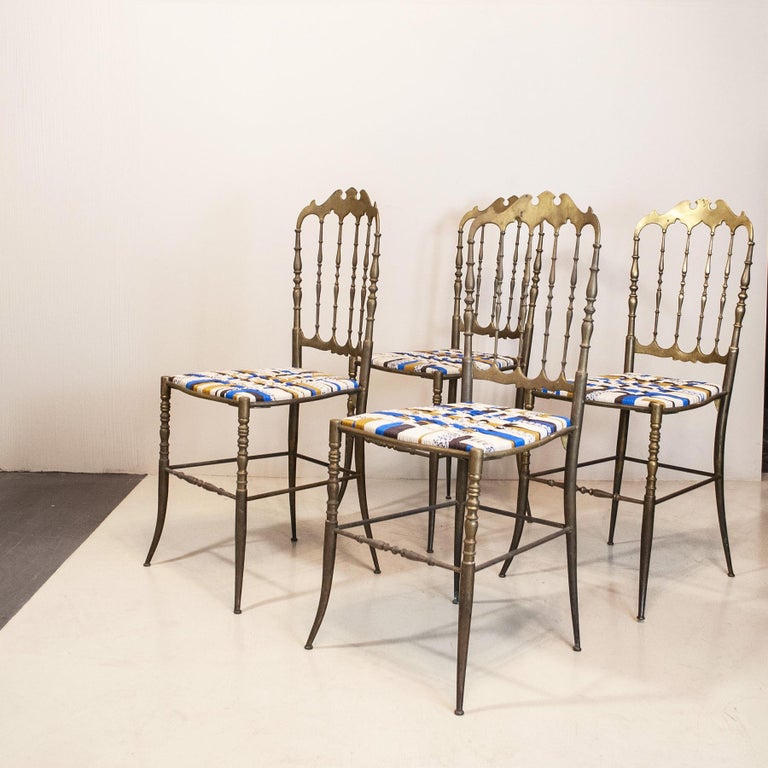 Set consisting of four iconic Chiavari (chiavarine) chairs in brass from the 1950s. The seats have been revisited in the upholstery now in rope made by hand by refined Salento artisans.