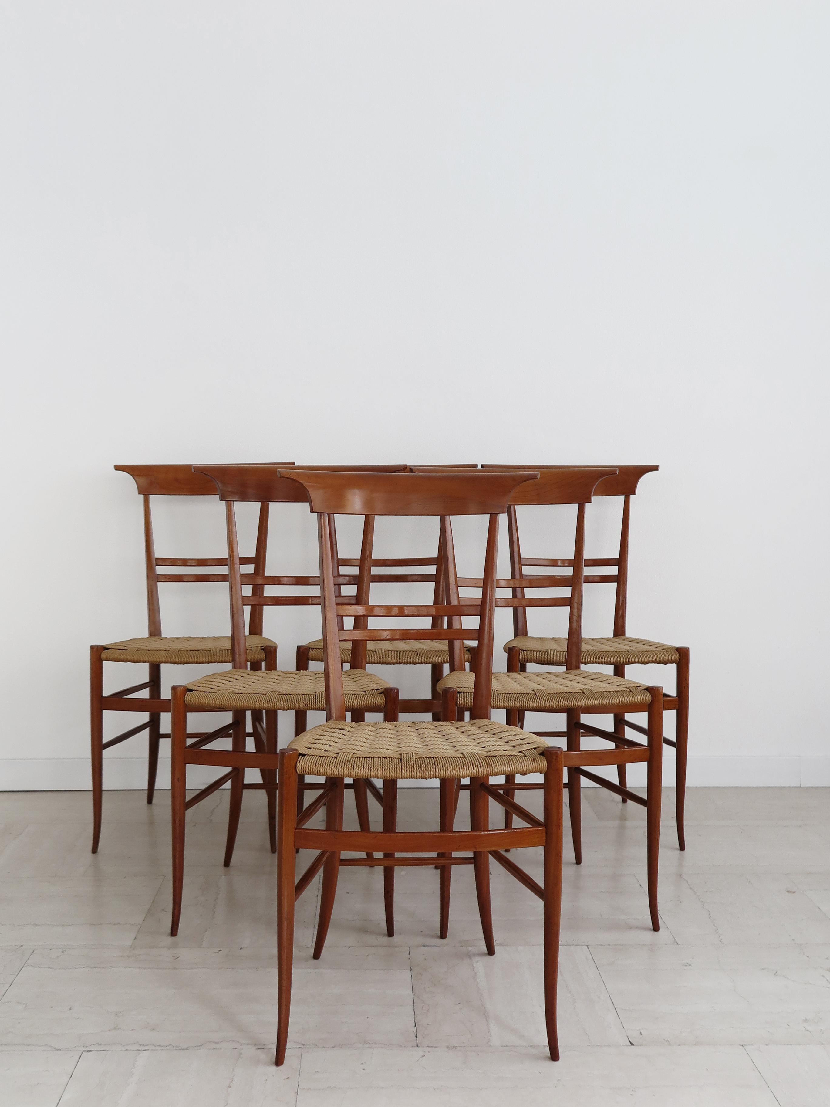 Set of six Italian Mid-Century Modern design dining chairs with wooden frame and rope seat, Italy 1960s.

Please note that the lset is original of the period and this shows normal signs of age and use.