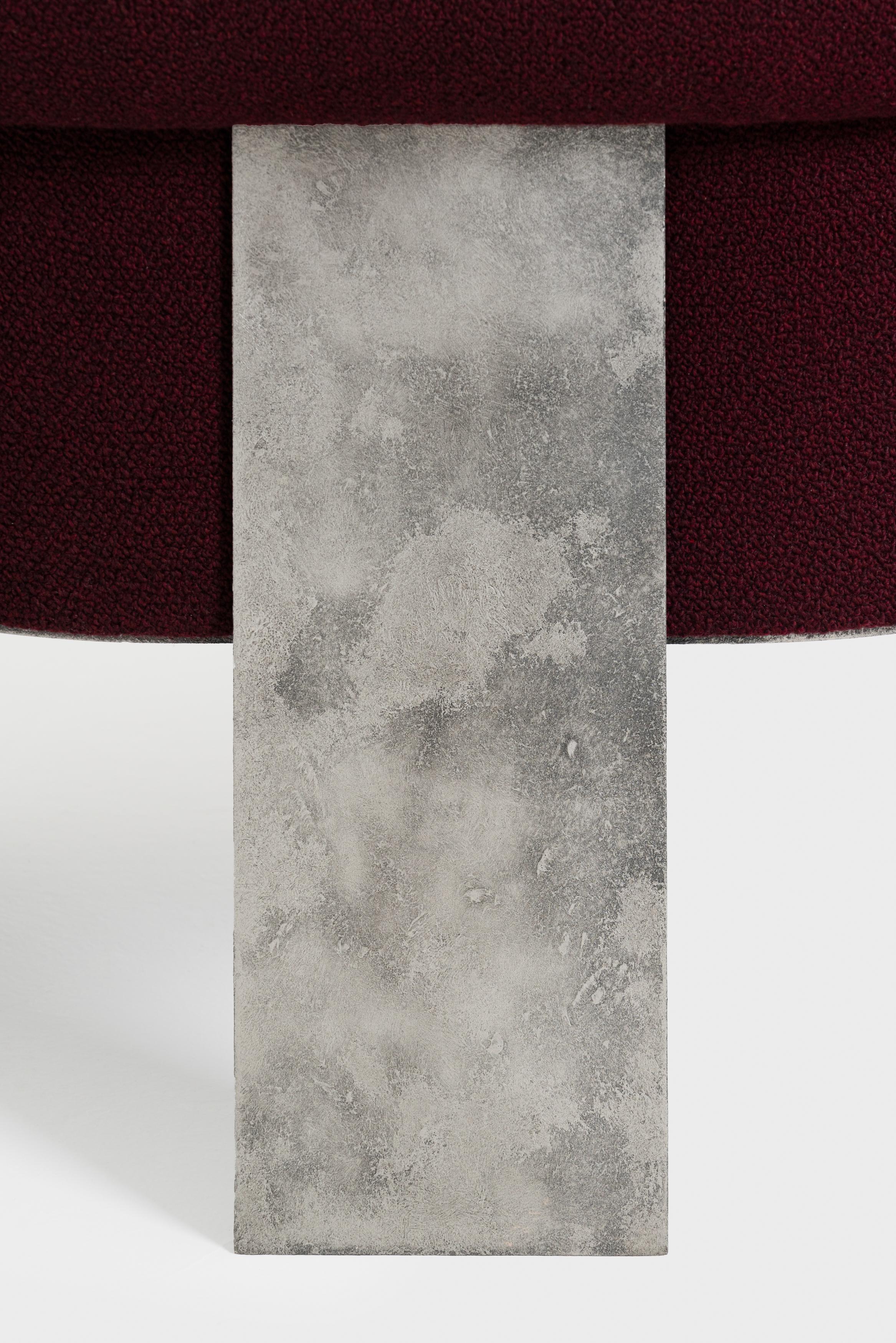 Chiavris armchair is made of three fabricated metal layers and upholstered in
bouclè fabric that unites both industrial taste and classic refinement.

Chiavris was part of Metallica, an exhibition curated by Matteo Cibic that explores metal and its